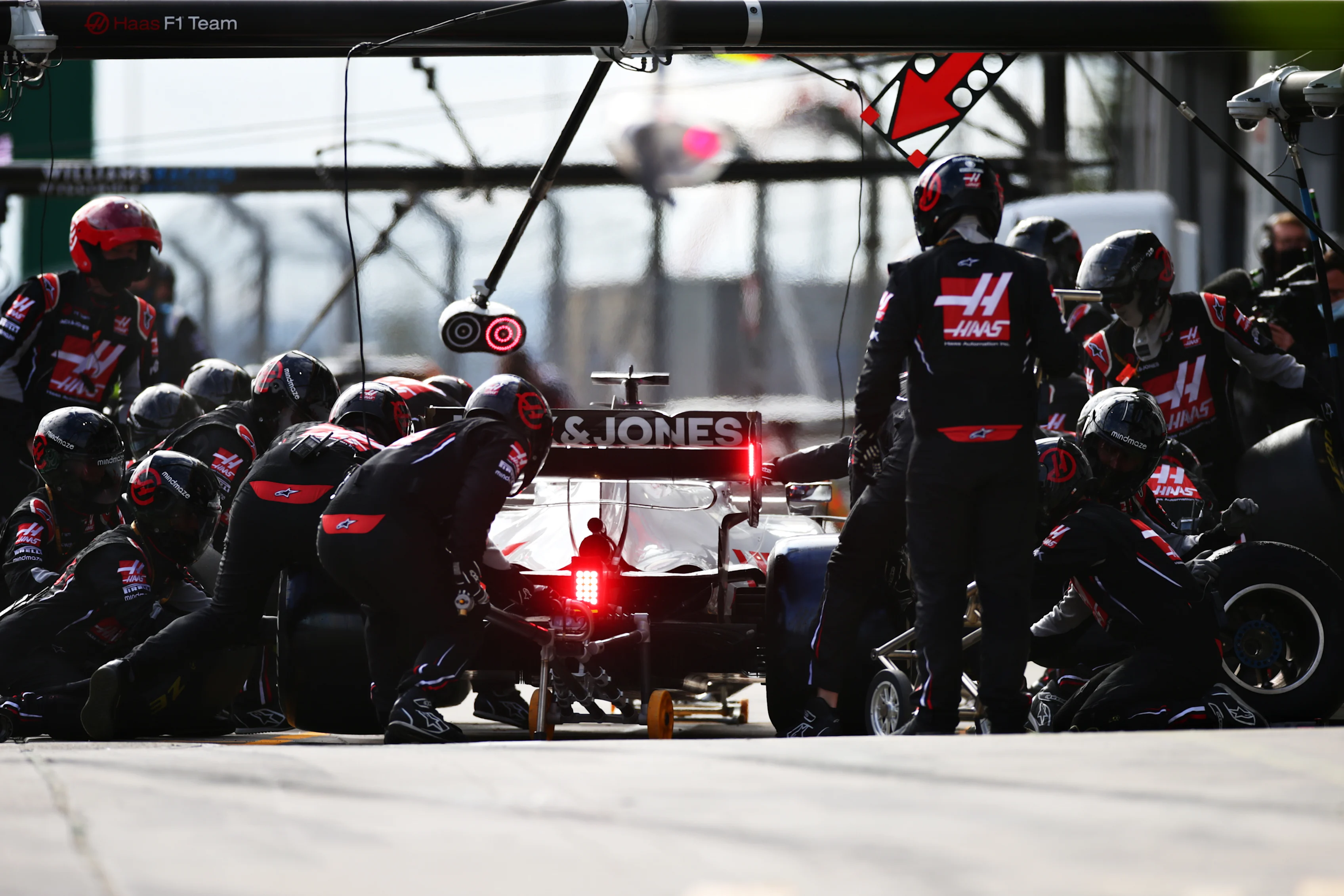 NUERBURG, GERMANY - OCTOBER 11: Romain Grosjean of France driving the (8) Haas F1 Team VF-20 Ferrari makes a pitstop during the F1 Eifel Grand Prix at Nuerburgring on October 11, 2020 in Nuerburg, Germany. (Photo by Peter Fox/Getty Images)