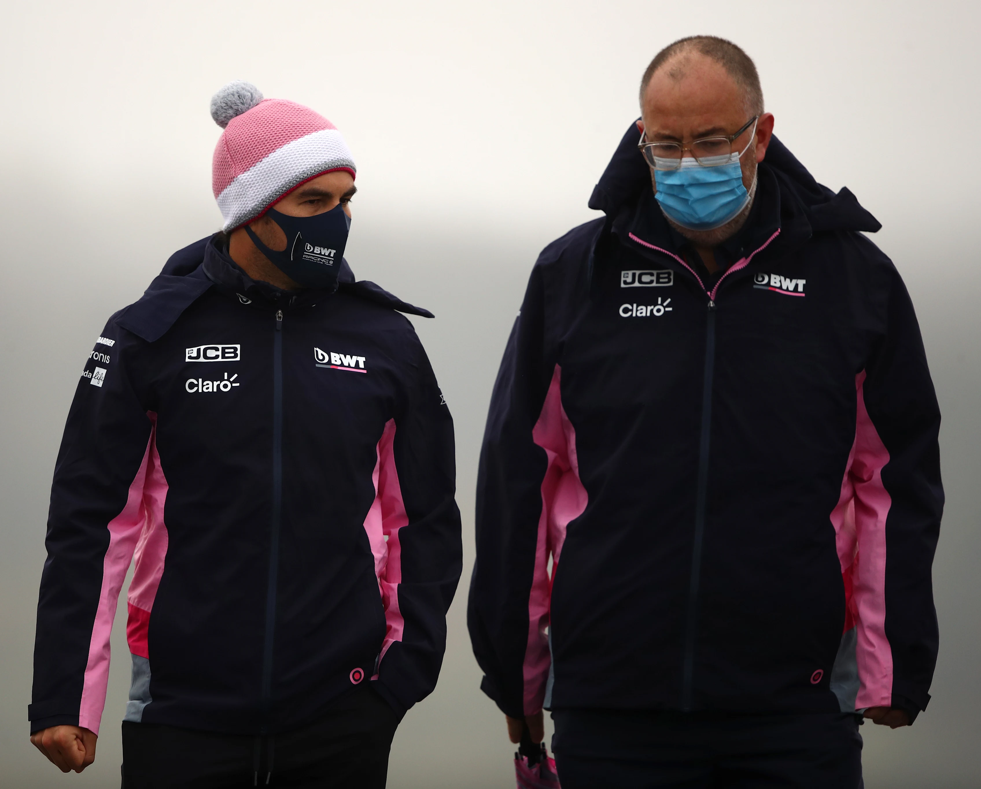 NUERBURG, GERMANY - OCTOBER 08: Sergio Perez of Mexico and Racing Point walks the track with his
