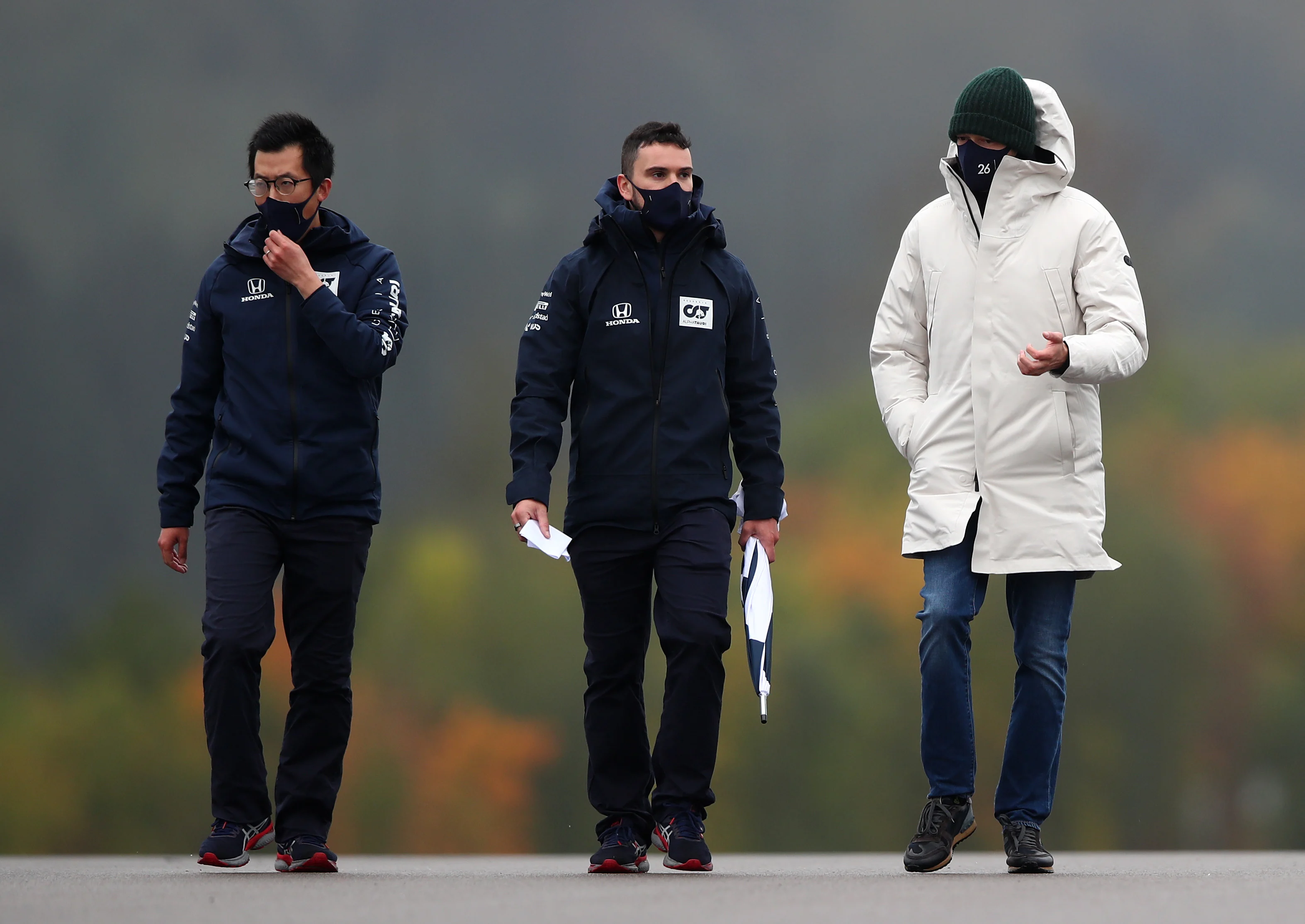 NUERBURG, GERMANY - OCTOBER 08: Daniil Kvyat of Russia and Scuderia AlphaTauri walks the track with