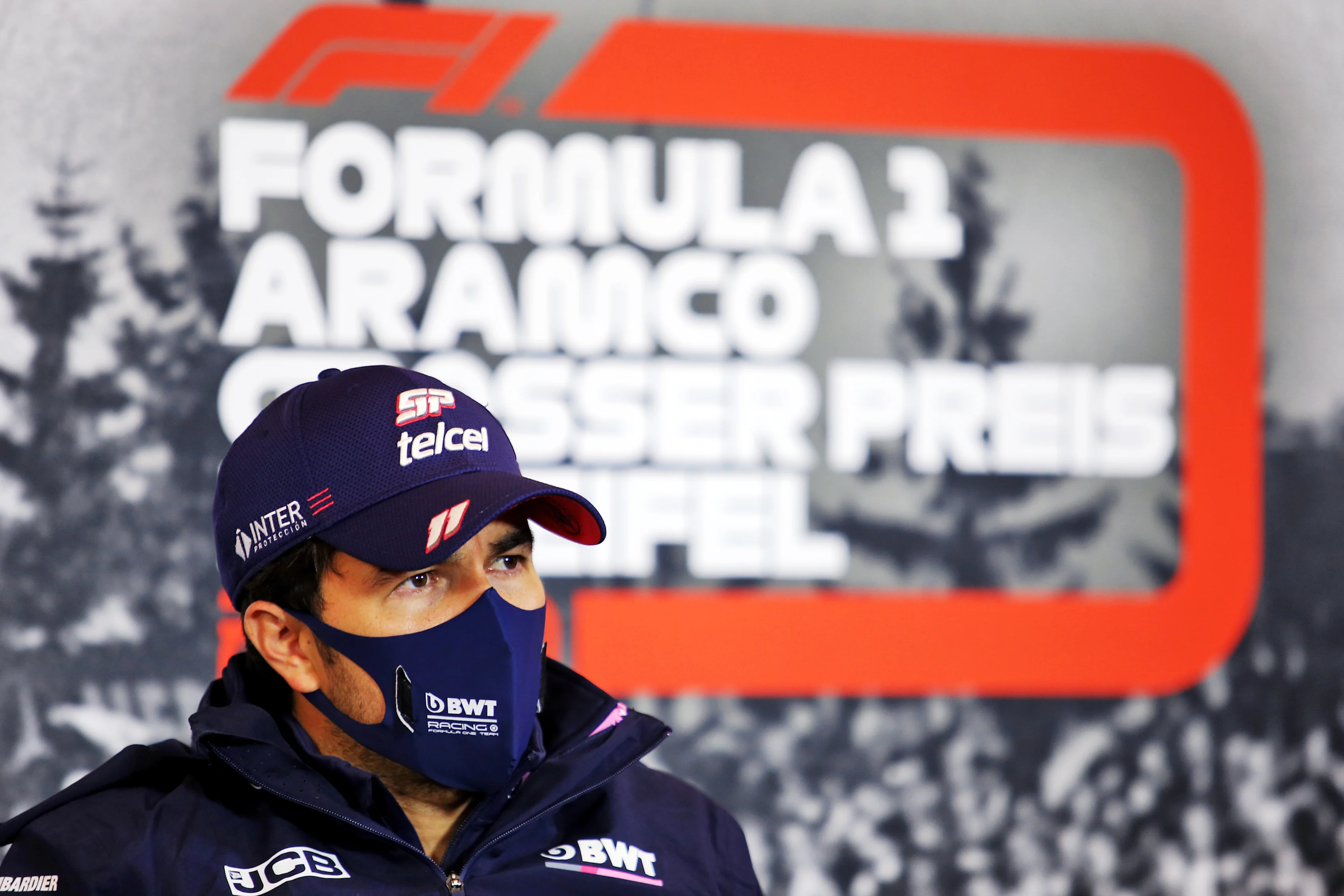 NUERBURG, GERMANY - OCTOBER 08: Sergio Perez of Mexico and Racing Point talks in the Drivers Press