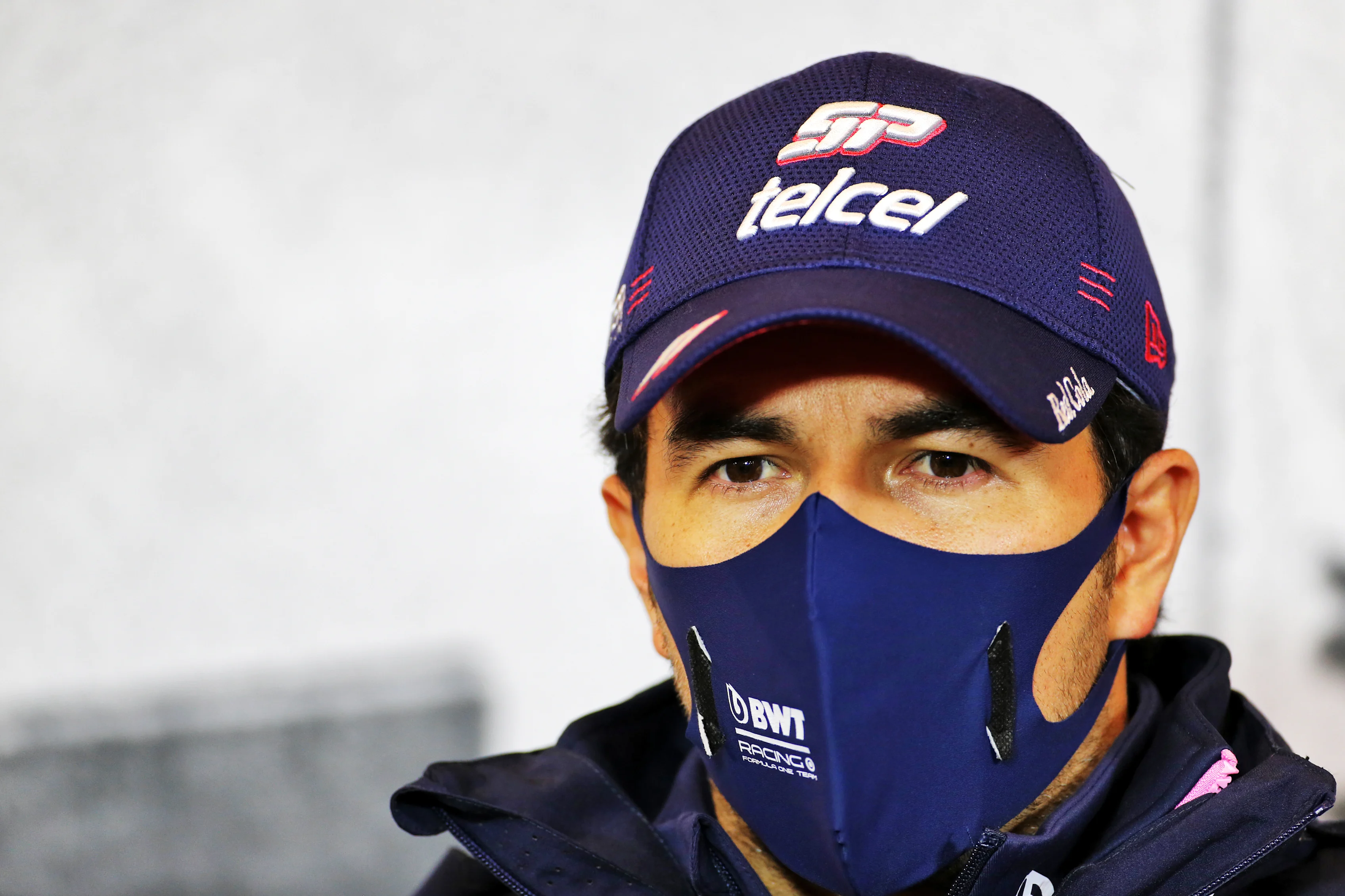 NUERBURG, GERMANY - OCTOBER 08: Sergio Perez of Mexico and Racing Point talks in the Drivers Press