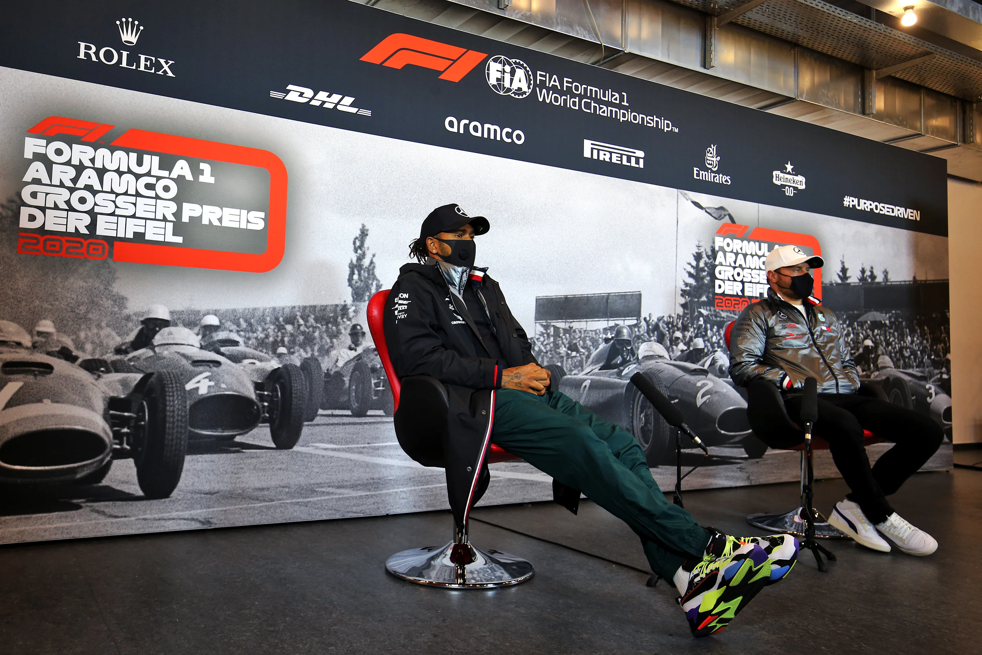 NUERBURG, GERMANY - OCTOBER 08: Lewis Hamilton of Great Britain and Mercedes GP and Valtteri Bottas