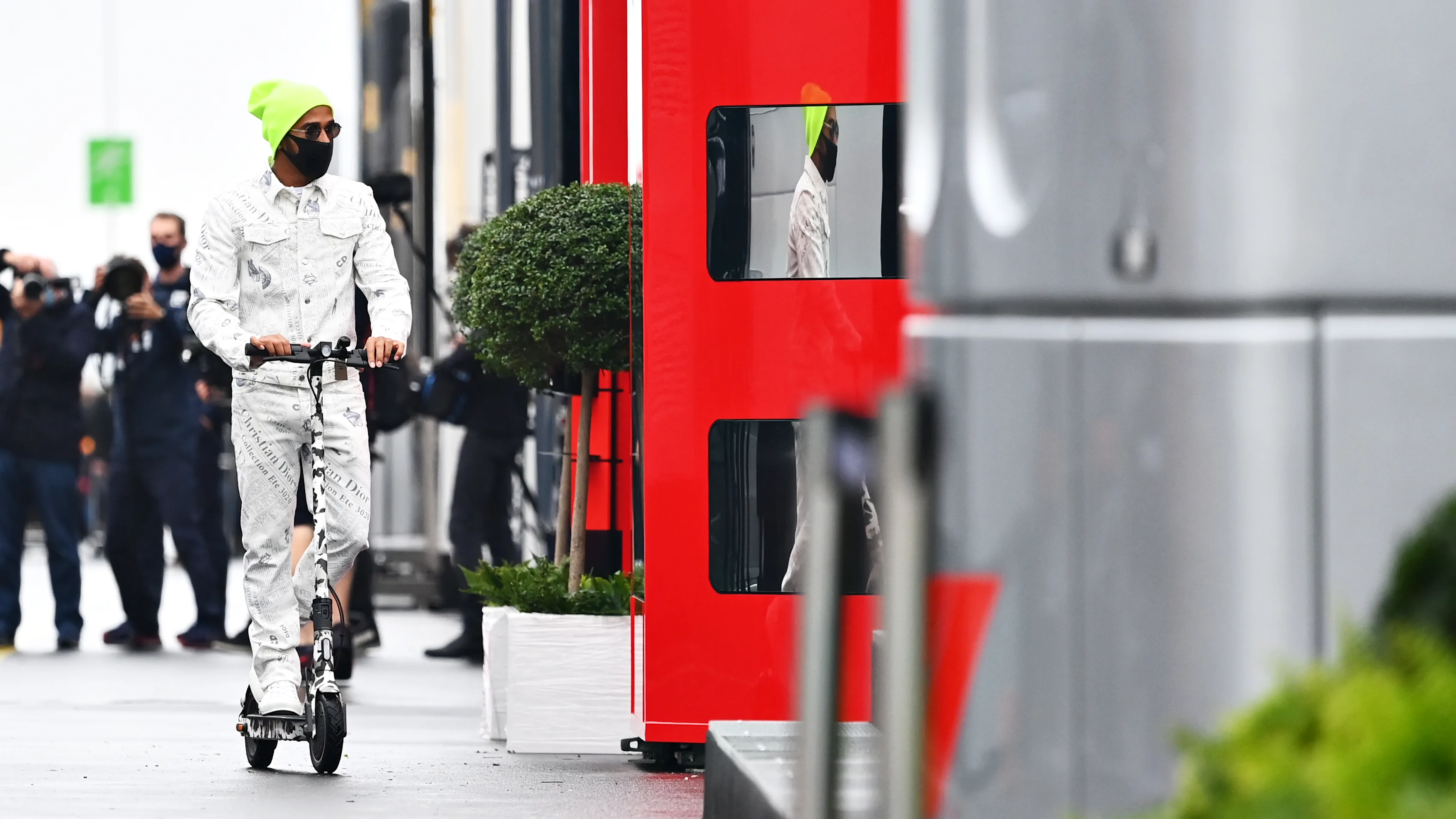 NUERBURG, GERMANY - OCTOBER 08: Lewis Hamilton of Great Britain and Mercedes GP rides a scooter in