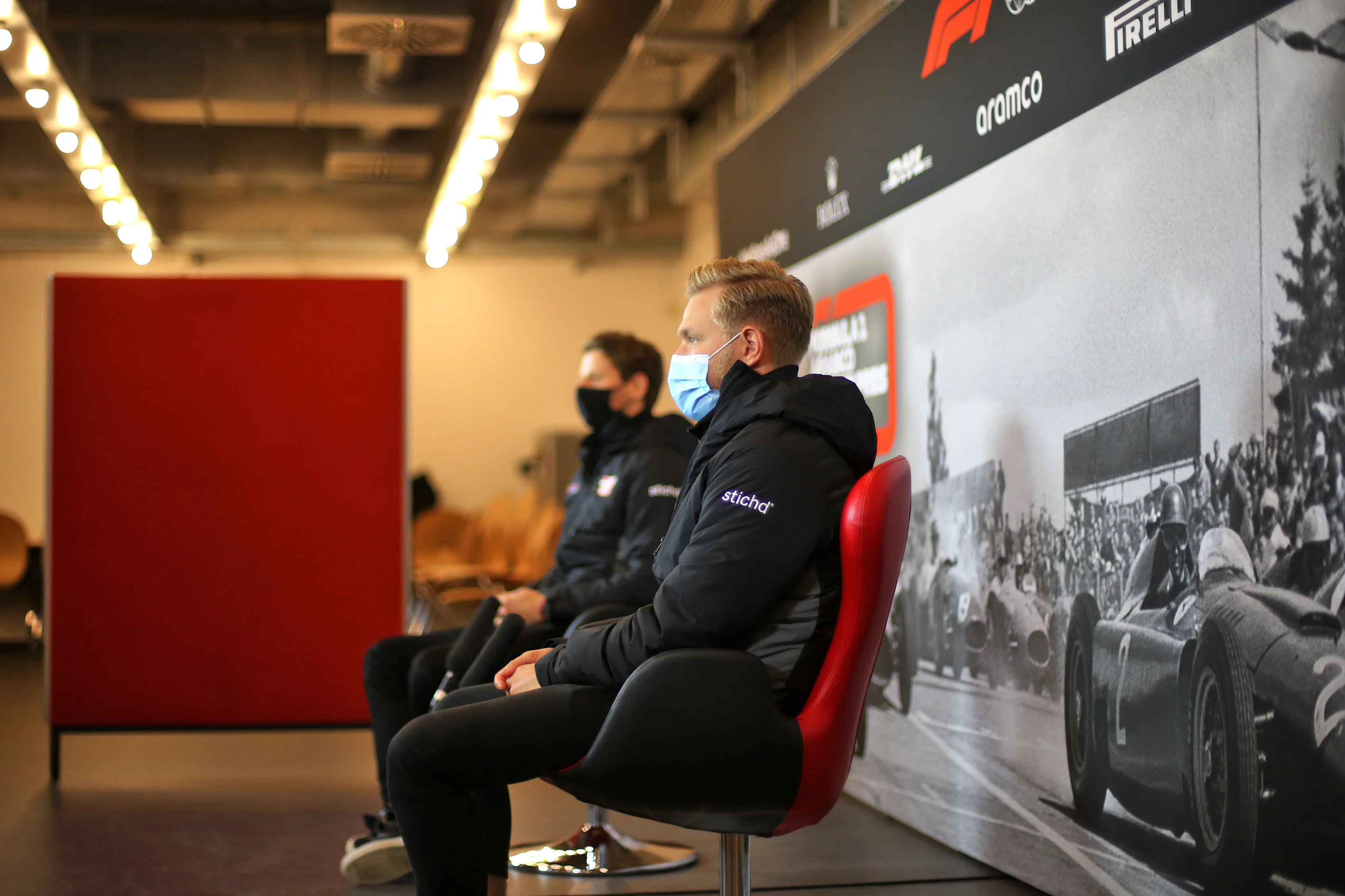 NUERBURG, GERMANY - OCTOBER 08: Romain Grosjean of France and Haas F1 and Kevin Magnussen of
