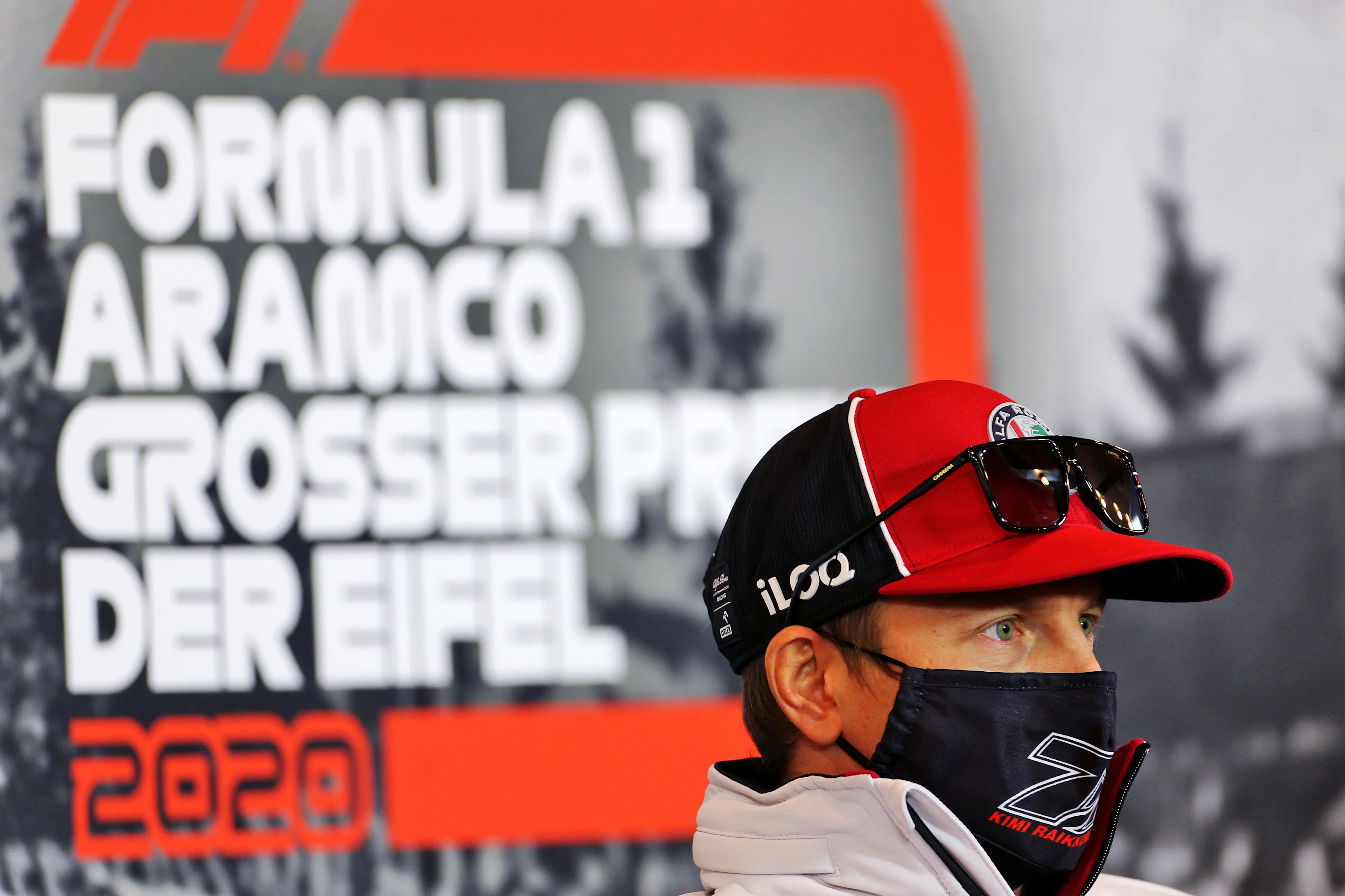 NUERBURG, GERMANY - OCTOBER 08: Kimi Raikkonen of Finland and Alfa Romeo Racing talks in the