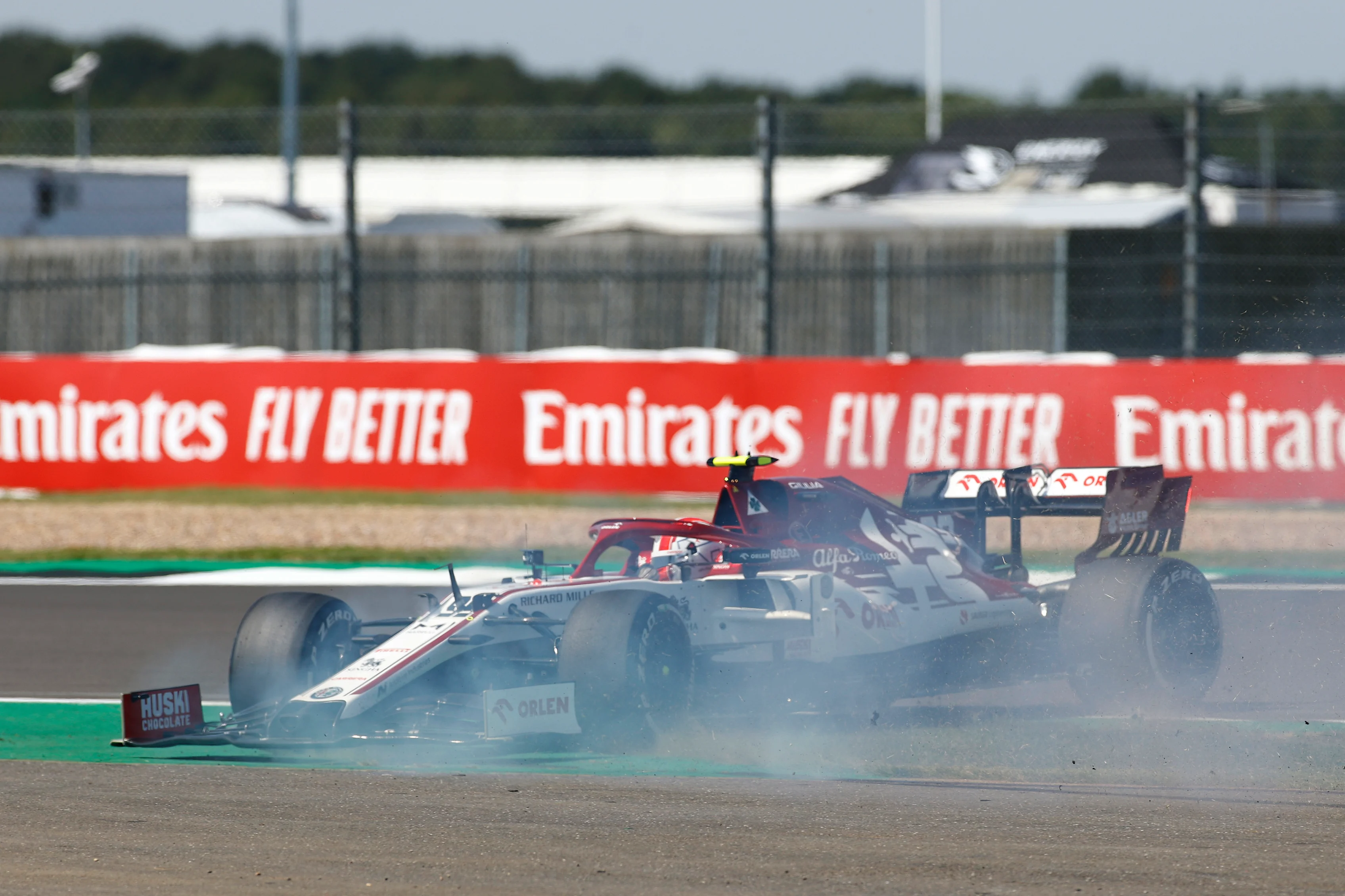 NORTHAMPTON, ENGLAND - JULY 31: Antonio Giovinazzi of Italy driving the (99) Alfa Romeo Racing C39 Ferrari spins on track during practice for the F1 Grand Prix of Great Britain at Silverstone on July 31, 2020 in Northampton, England. (Photo by Andrew Boyers/Pool via Getty Image)