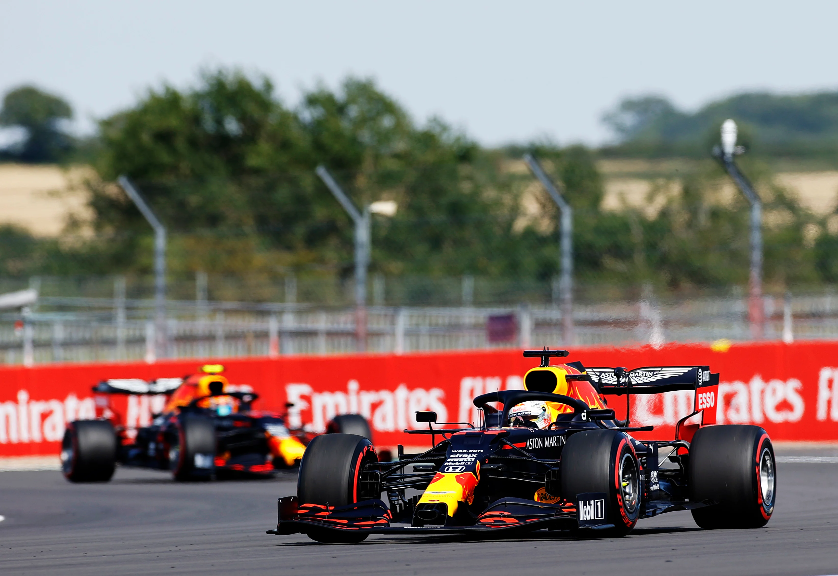 NORTHAMPTON, ENGLAND - JULY 31: Max Verstappen of the Netherlands driving the (33) Aston Martin Red
