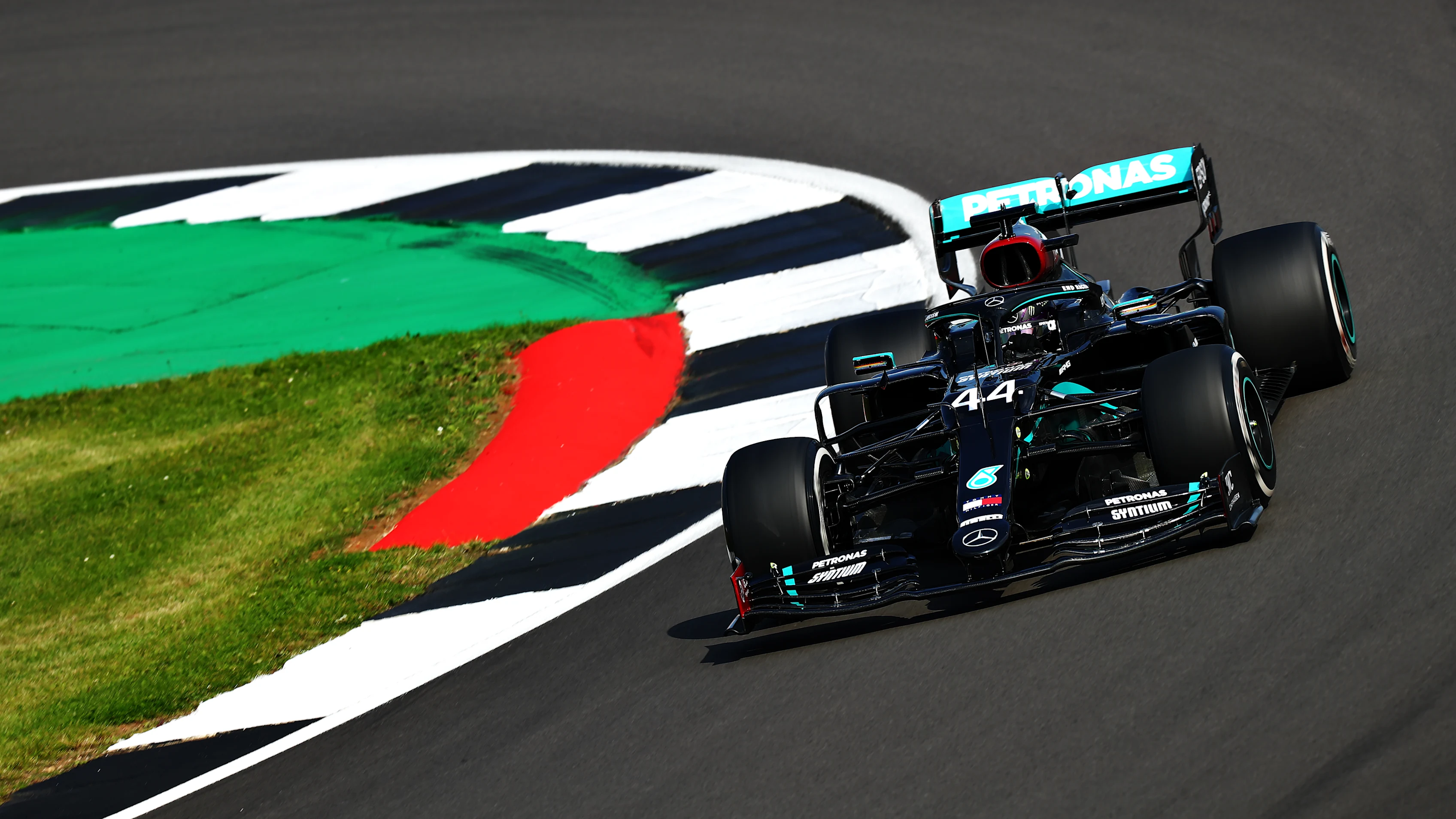 NORTHAMPTON, ENGLAND - JULY 31: Lewis Hamilton of Great Britain driving the (44) Mercedes AMG