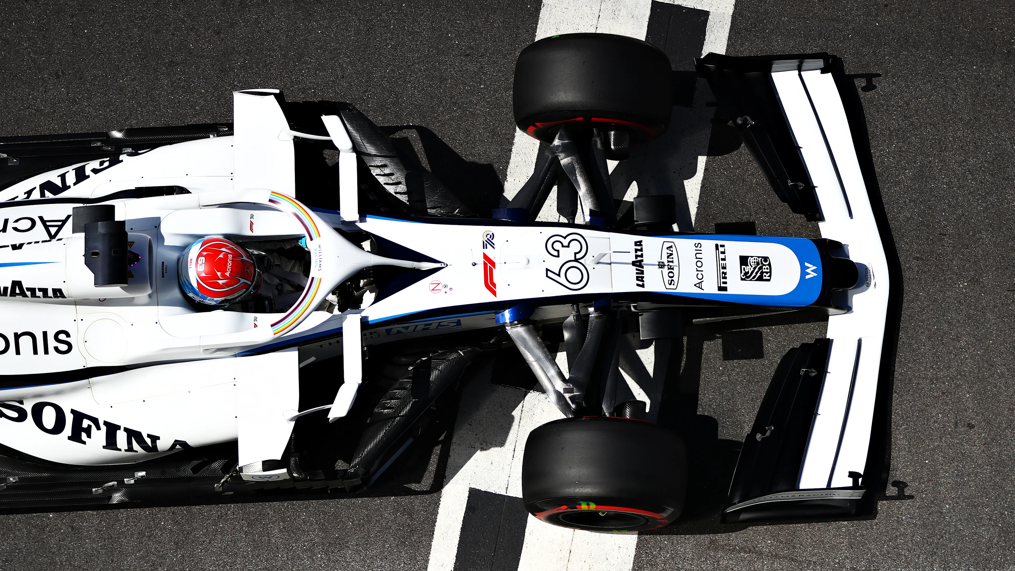 NORTHAMPTON, ENGLAND - AUGUST 01: George Russell of Great Britain driving the (63) Williams Racing