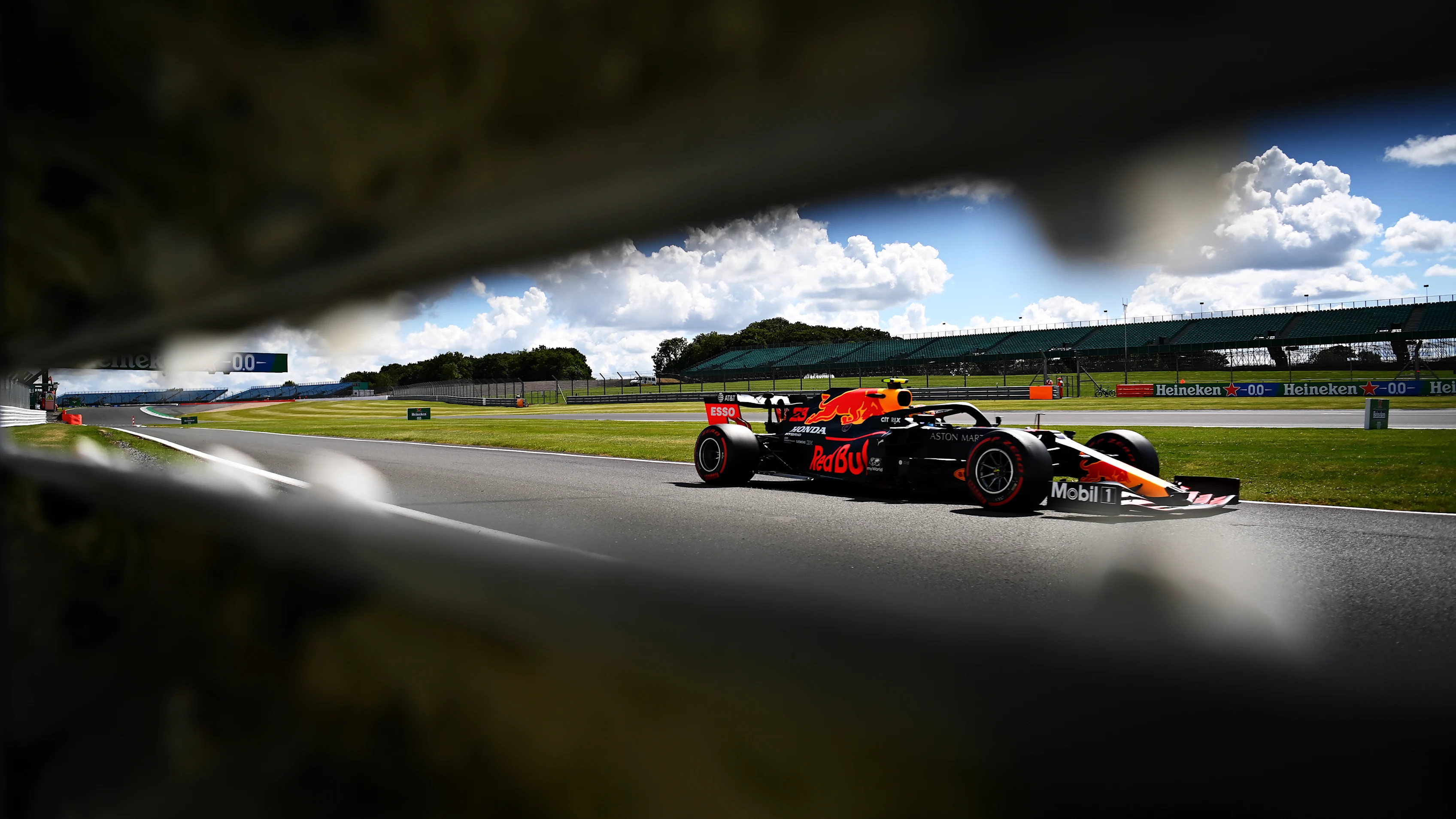 NORTHAMPTON, ENGLAND - AUGUST 01: Alexander Albon of Thailand driving the (23) Aston Martin Red