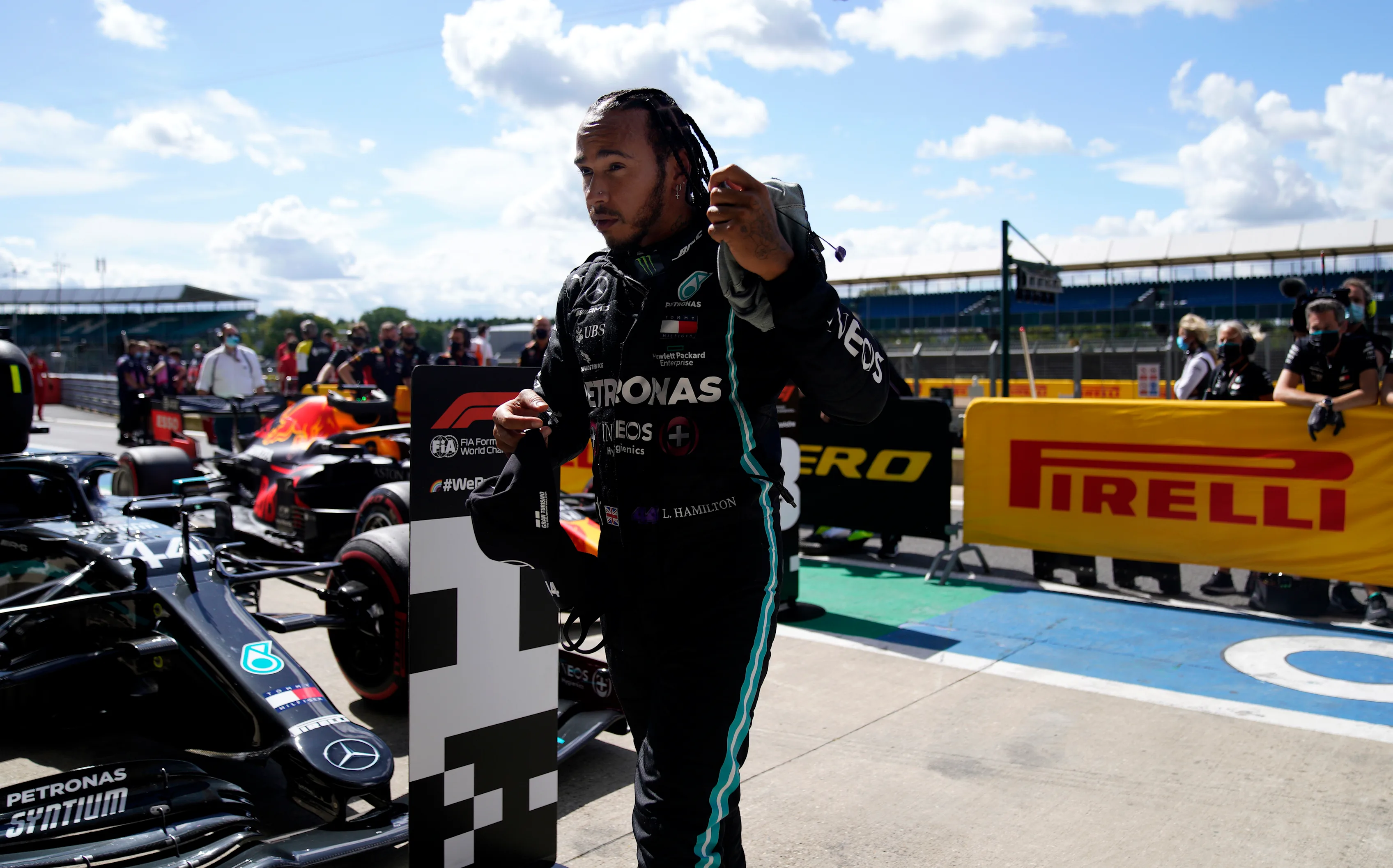 NORTHAMPTON, ENGLAND - AUGUST 01: Pole position qualifier Lewis Hamilton of Great Britain and