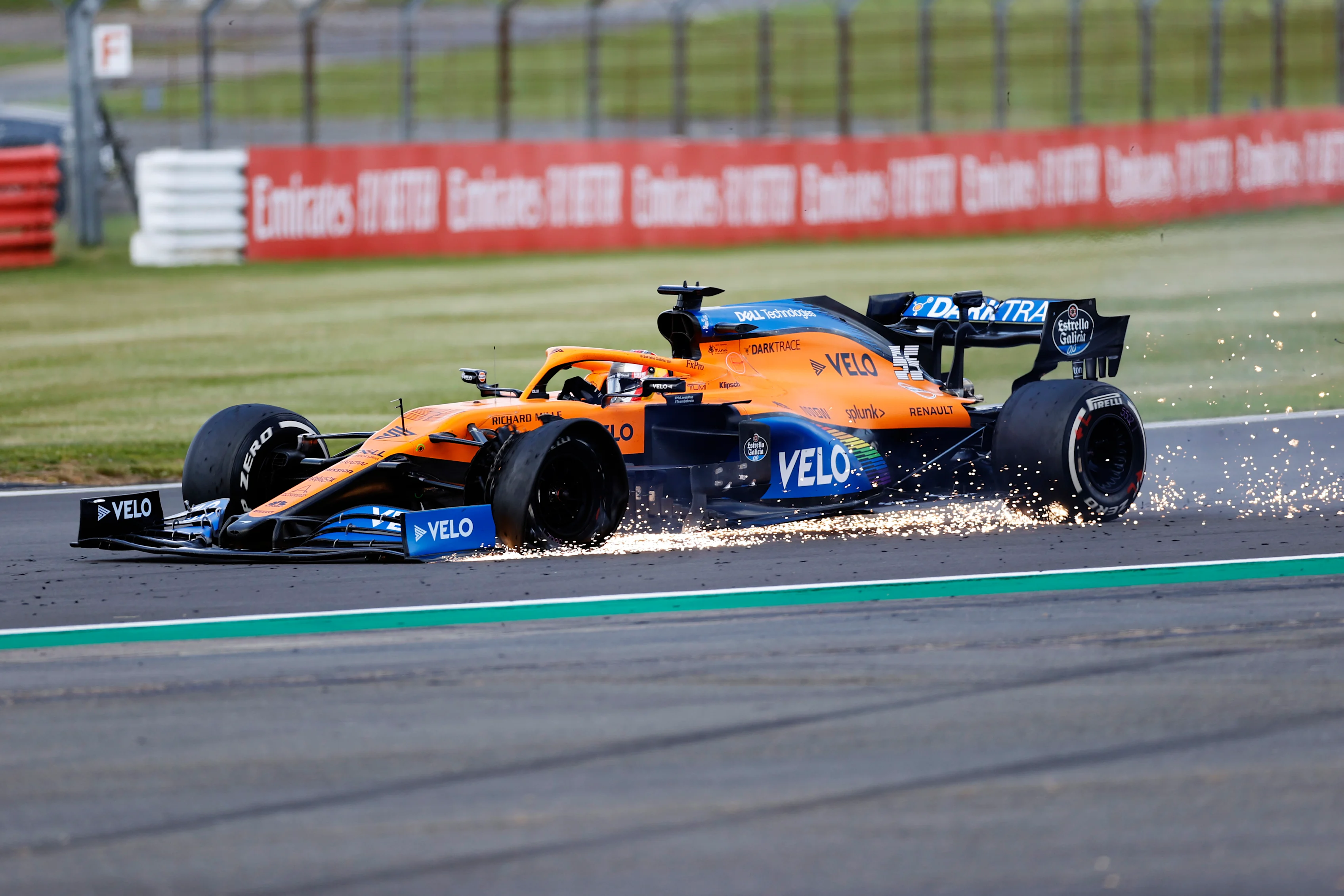 NORTHAMPTON, ENGLAND - AUGUST 02: Carlos Sainz of Spain driving the (55) McLaren F1 Team MCL35