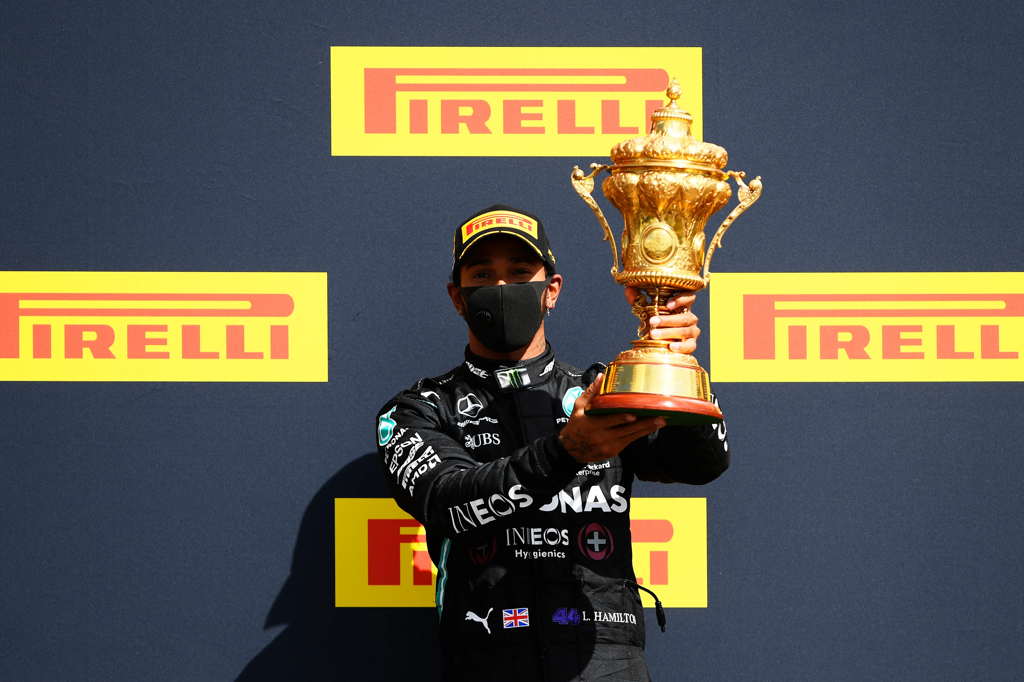 NORTHAMPTON, ENGLAND - AUGUST 02: Race winner Lewis Hamilton of Great Britain and Mercedes GP