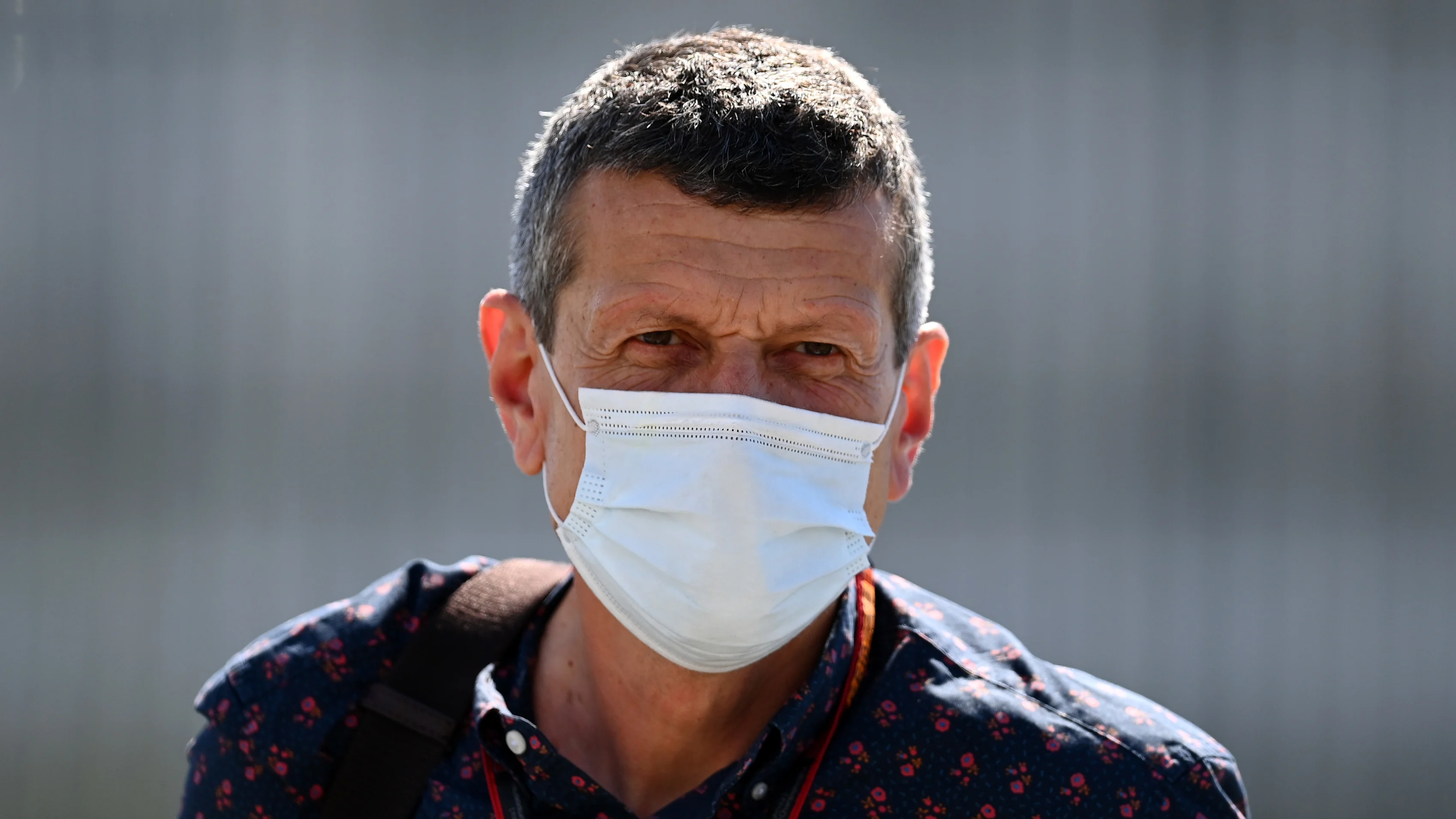 NORTHAMPTON, ENGLAND - JULY 30: Haas F1 Team Principal Guenther Steiner walks in the Paddock during