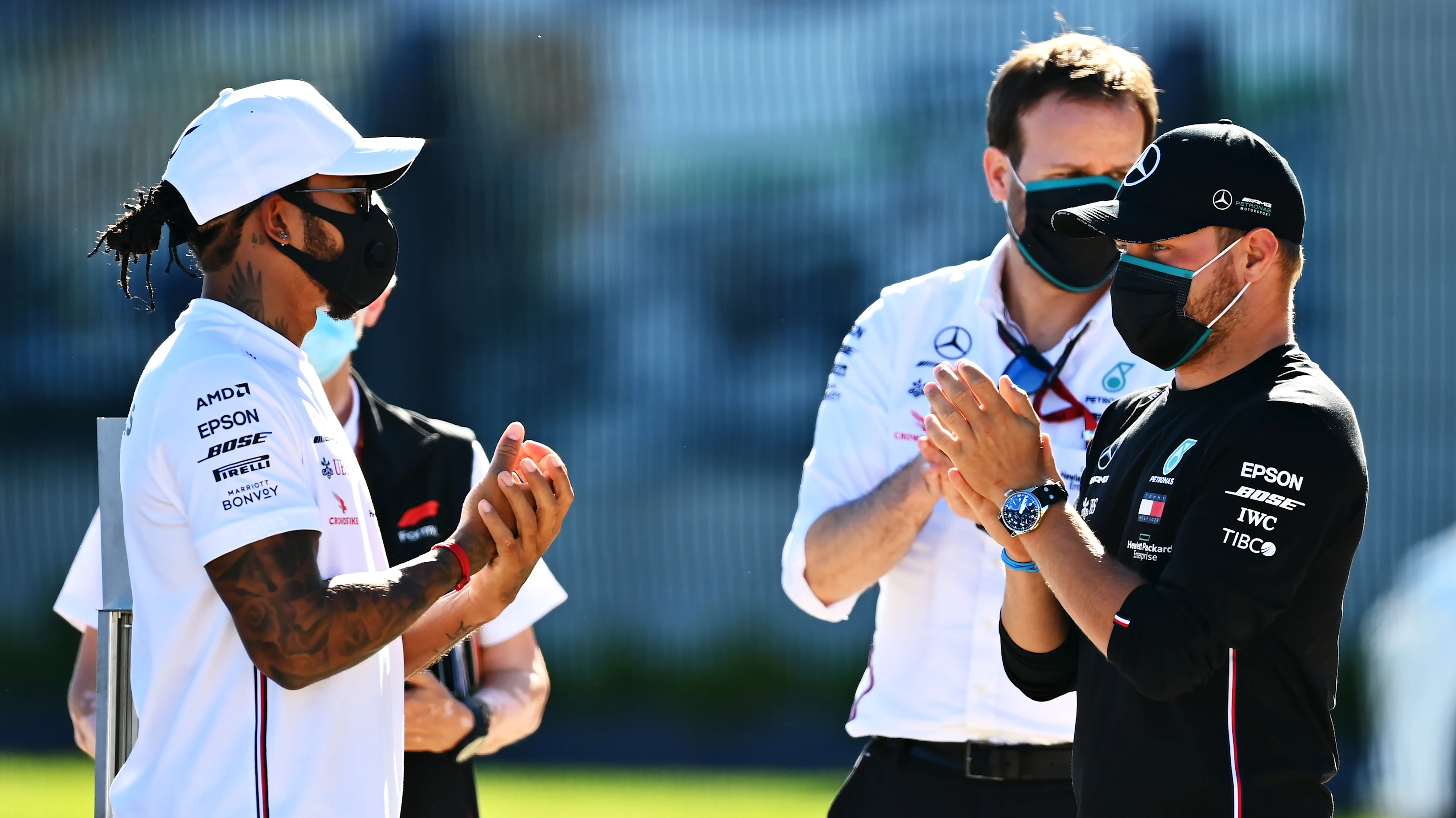 NORTHAMPTON, ENGLAND - JULY 30: Lewis Hamilton of Great Britain and Mercedes GP and Valtteri Bottas