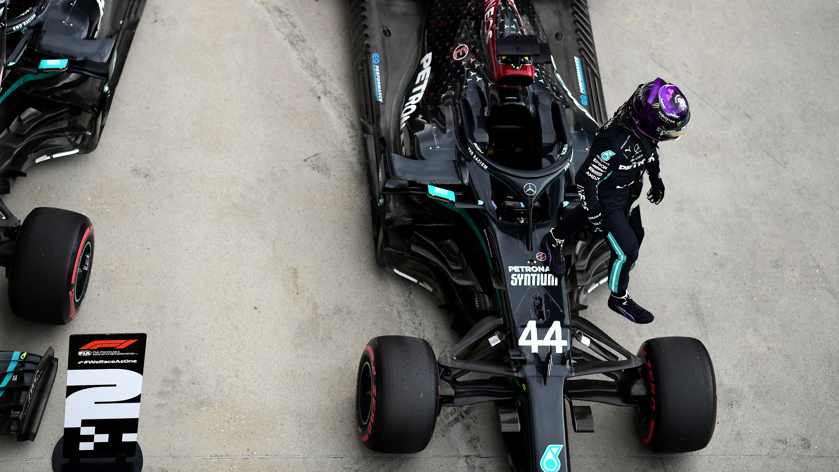 BUDAPEST, HUNGARY - JULY 18: Pole position qualifier Lewis Hamilton of Great Britain and Mercedes GP celebrates in parc ferme  during qualifying for the F1 Grand Prix of Hungary at Hungaroring on July 18, 2020 in Budapest, Hungary. (Photo by Mario Renzi - Formula 1/Formula 1 via Getty Images)