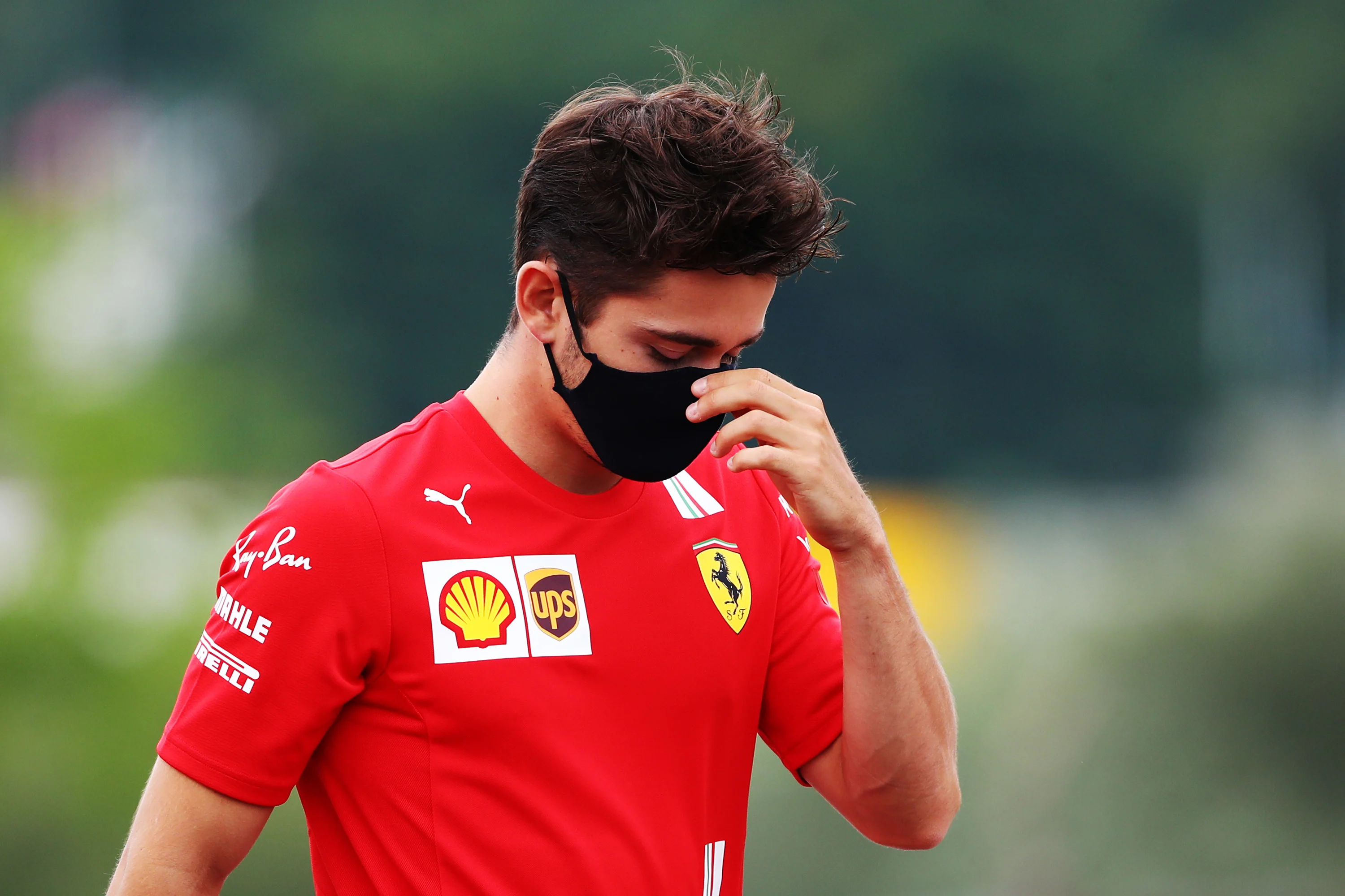BUDAPEST, HUNGARY - JULY 16: Charles Leclerc of Monaco and Ferrari walks the track during previews
