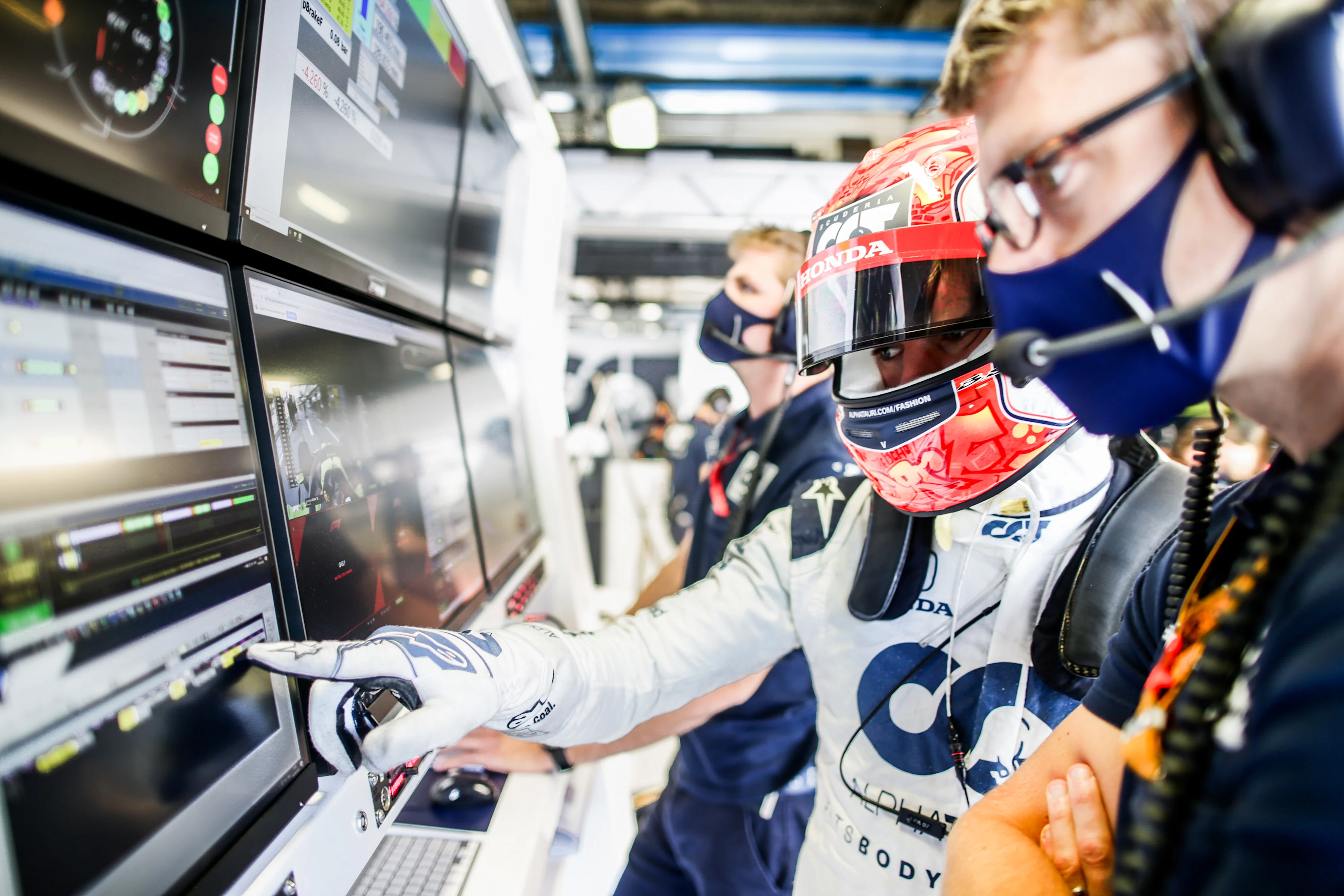 MONZA, ITALY - SEPTEMBER 04: Pierre Gasly of Scuderia AlphaTauri and France with his engineer