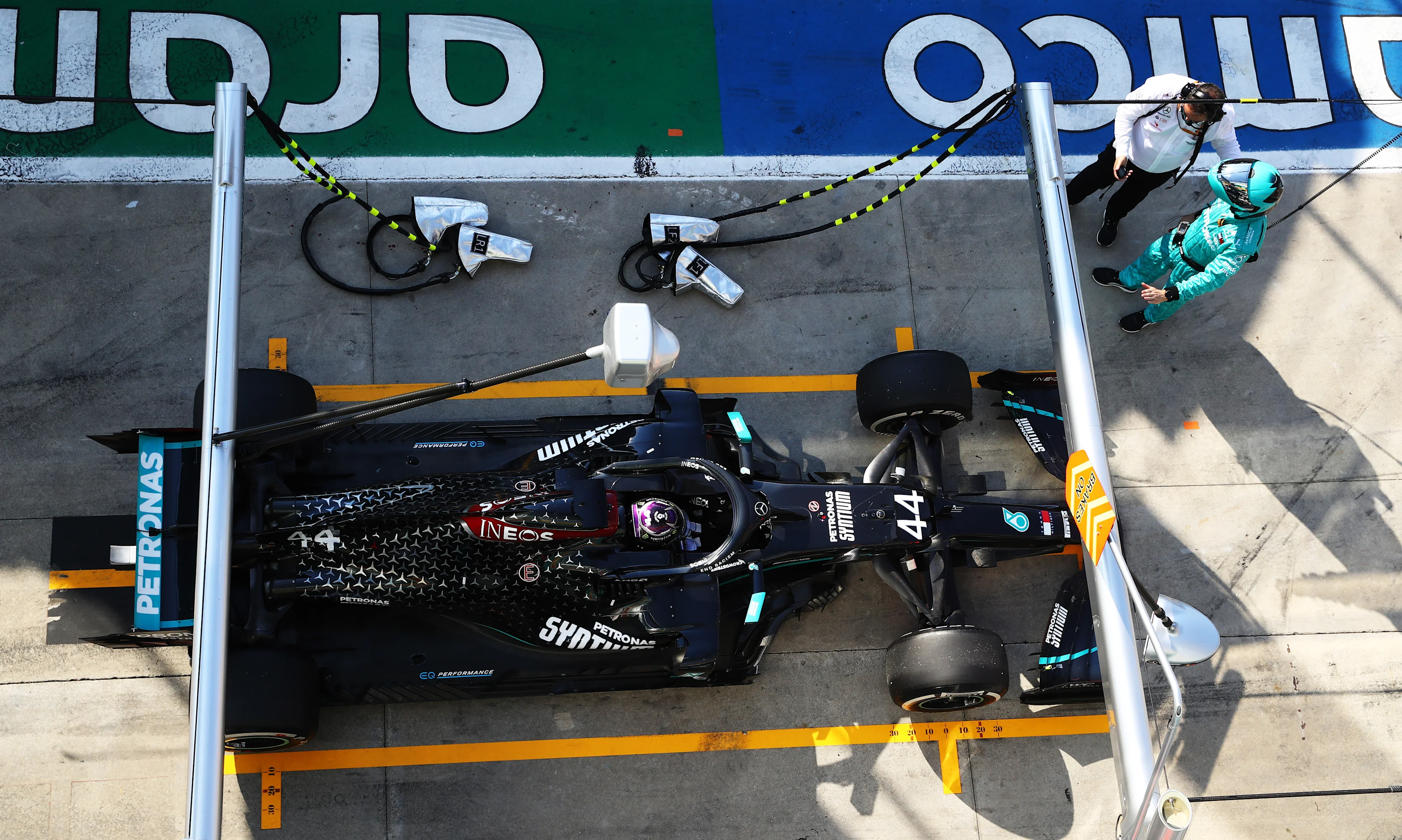 MONZA, ITALY - SEPTEMBER 06: Lewis Hamilton of Great Britain driving the (44) Mercedes AMG Petronas F1 Team Mercedes W11 stops in the Pitlane for a penalty during the F1 Grand Prix of Italy at Autodromo di Monza on September 06, 2020 in Monza, Italy. (Photo by Mark Thompson/Getty Images)