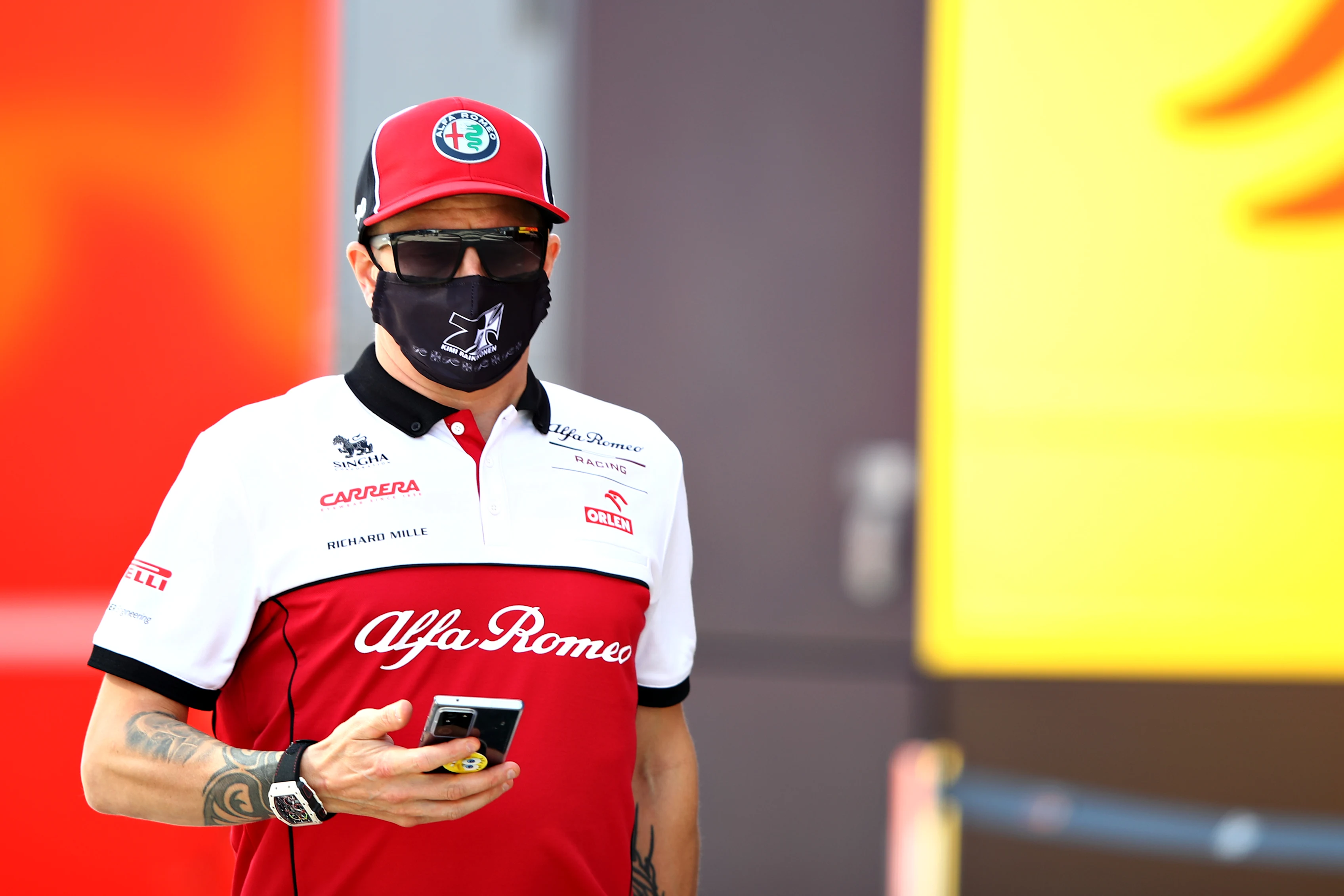 PORTIMAO, PORTUGAL - OCTOBER 22: Kimi Raikkonen of Finland and Alfa Romeo Racing walks in the