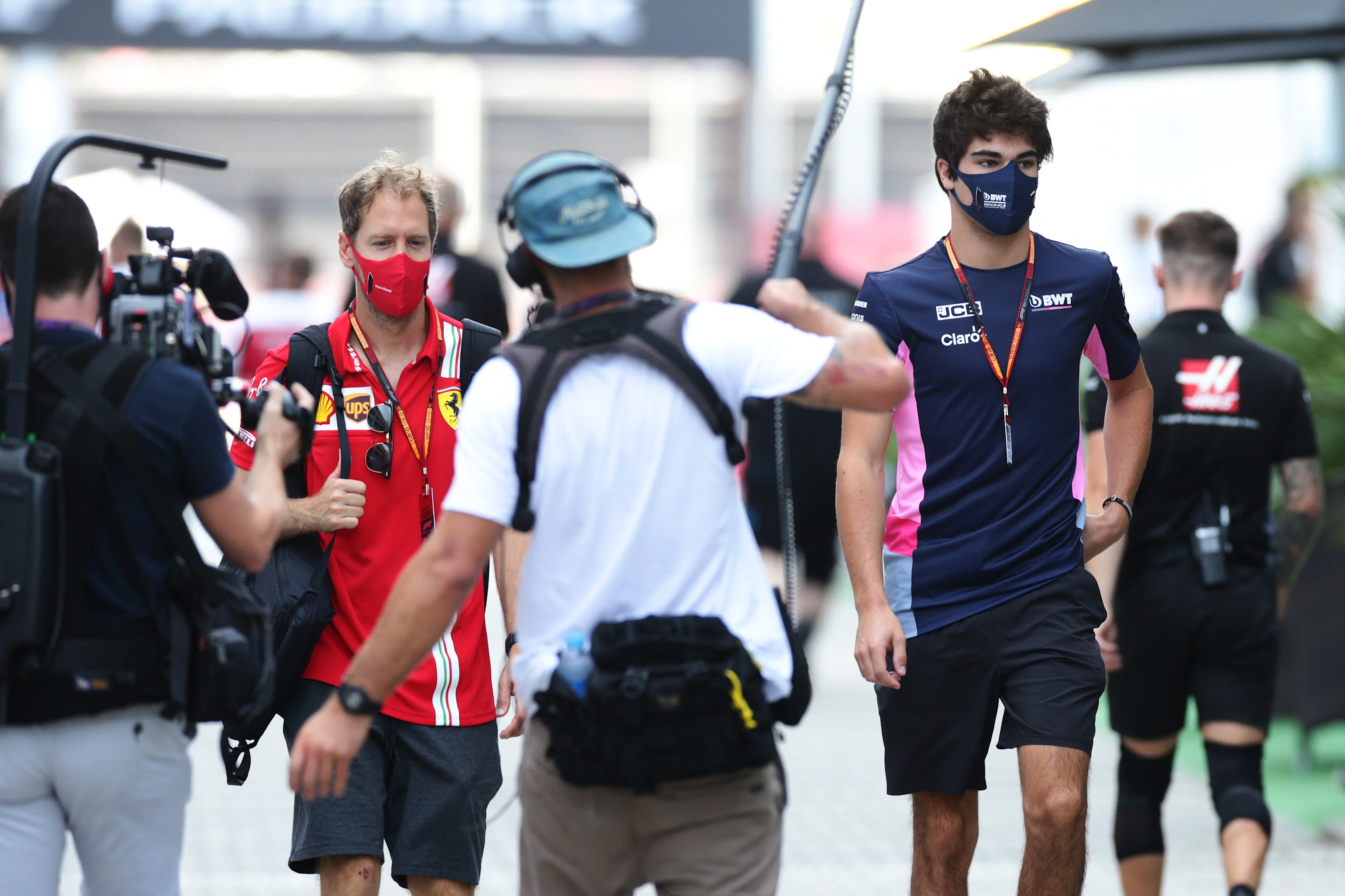 SOCHI, RUSSIA - SEPTEMBER 25: Sebastian Vettel of Germany and Ferrari and Lance Stroll of Canada