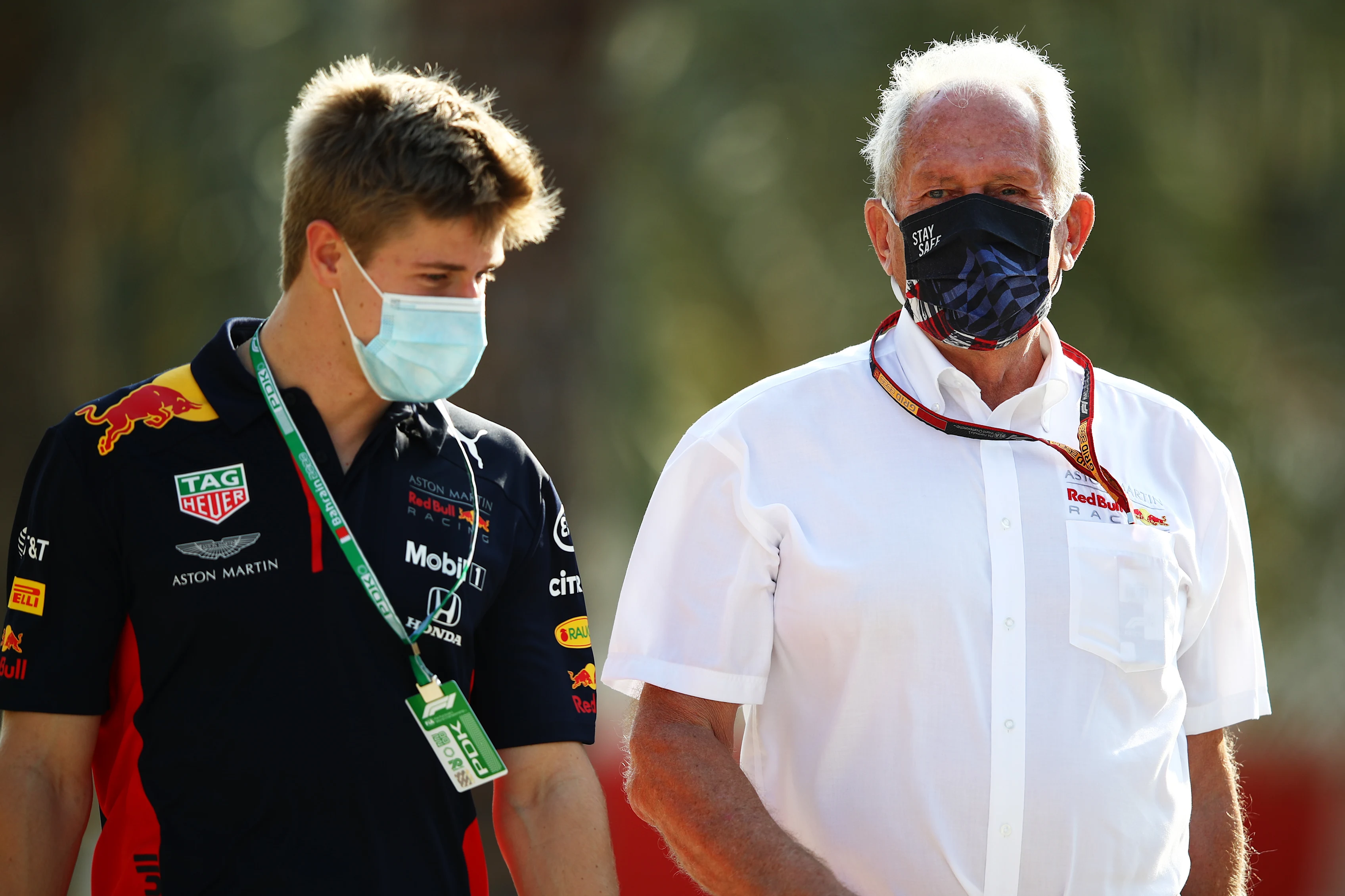 BAHRAIN, BAHRAIN - DECEMBER 04: Juri Vips of Estonia and Red Bull Racing speaks with Red Bull