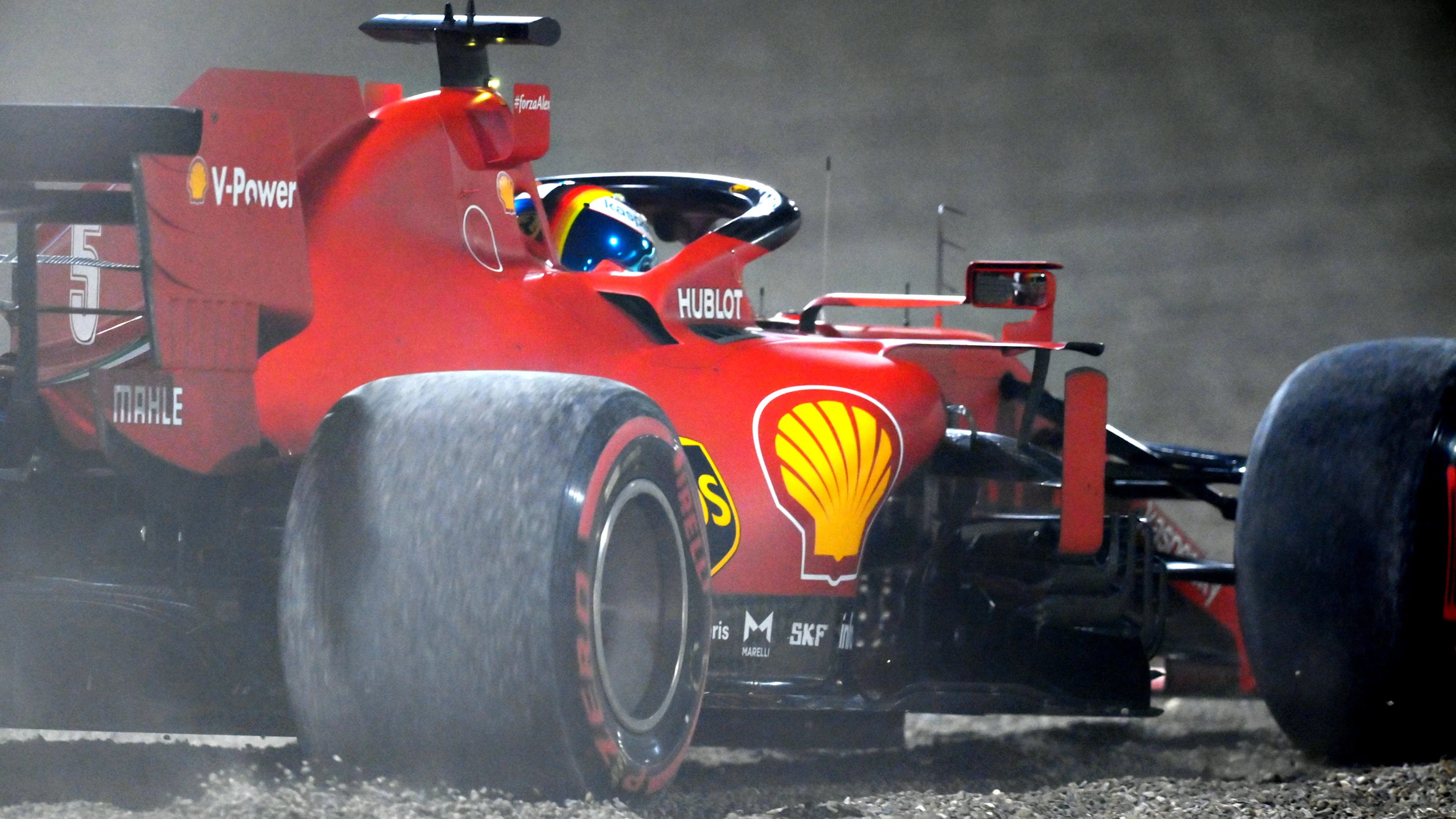 BAHRAIN, BAHRAIN - DECEMBER 04: Sebastian Vettel of Germany driving the (5) Scuderia Ferrari SF1000 runs wide during practice ahead of the F1 Grand Prix of Sakhir at Bahrain International Circuit on December 04, 2020 in Bahrain, Bahrain. (Photo by Clive Mason - Formula 1/Formula 1 via Getty Images)