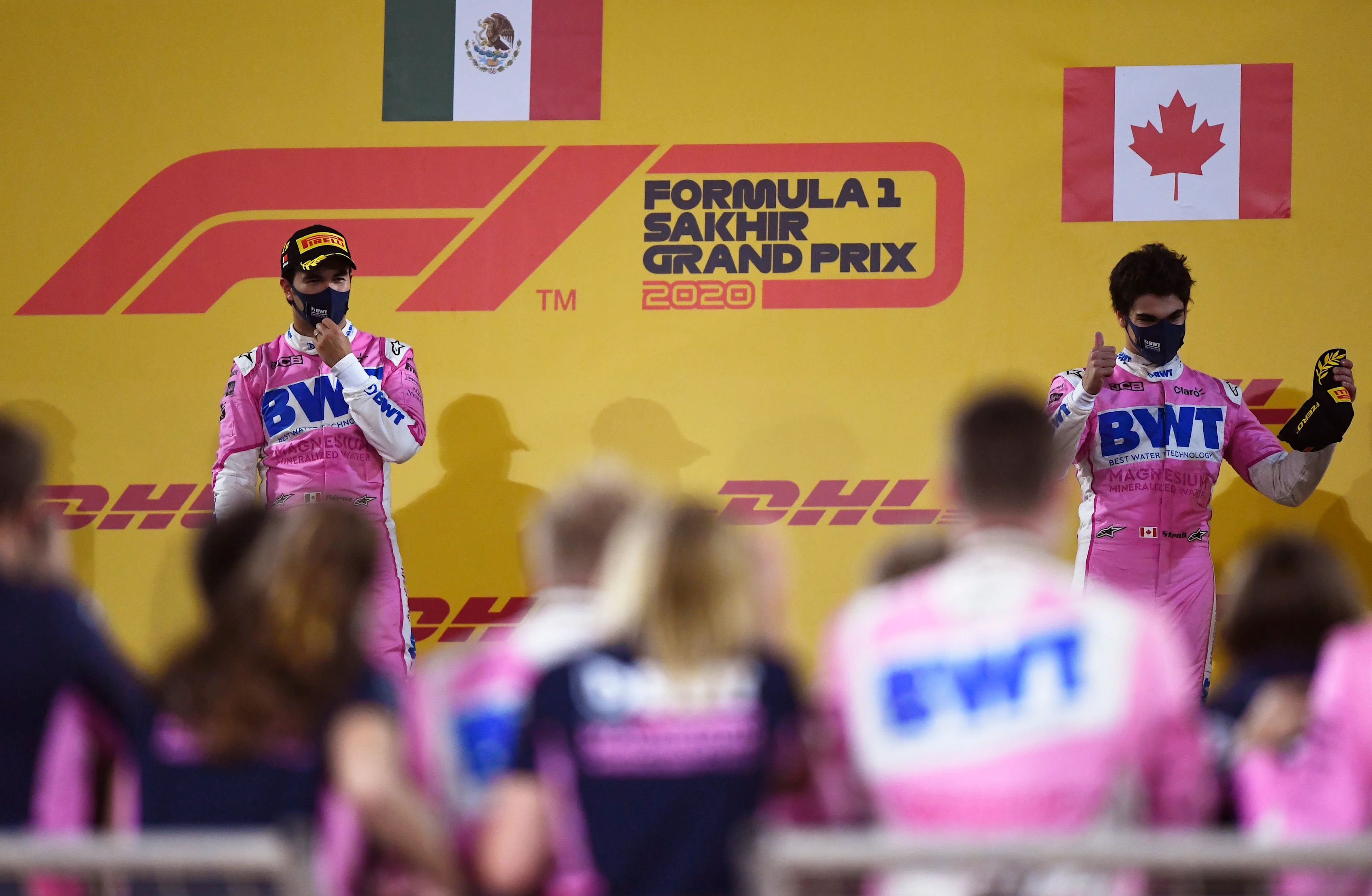 BAHRAIN, BAHRAIN - DECEMBER 06: Race winner Sergio Perez of Mexico and Racing Point and third