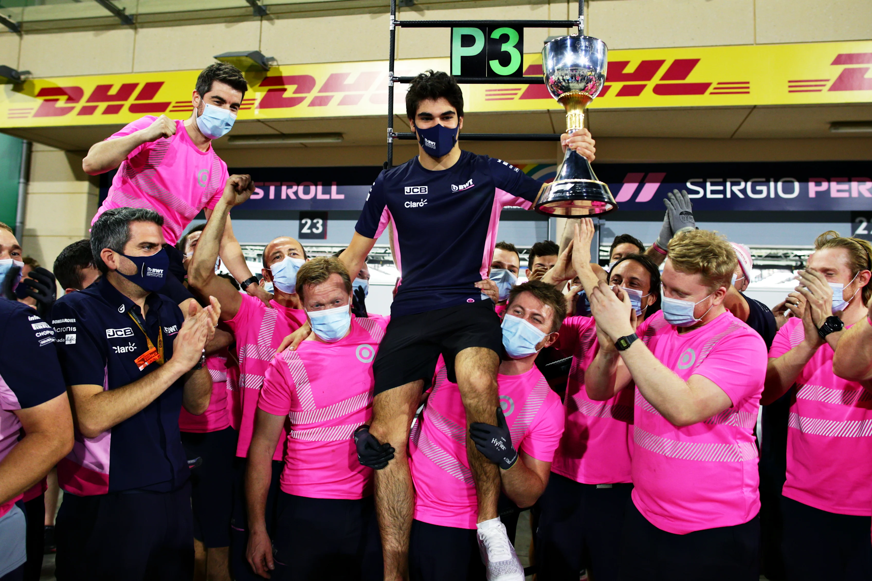BAHRAIN, BAHRAIN - DECEMBER 06: Third placed Lance Stroll of Canada and Racing Point celebrates