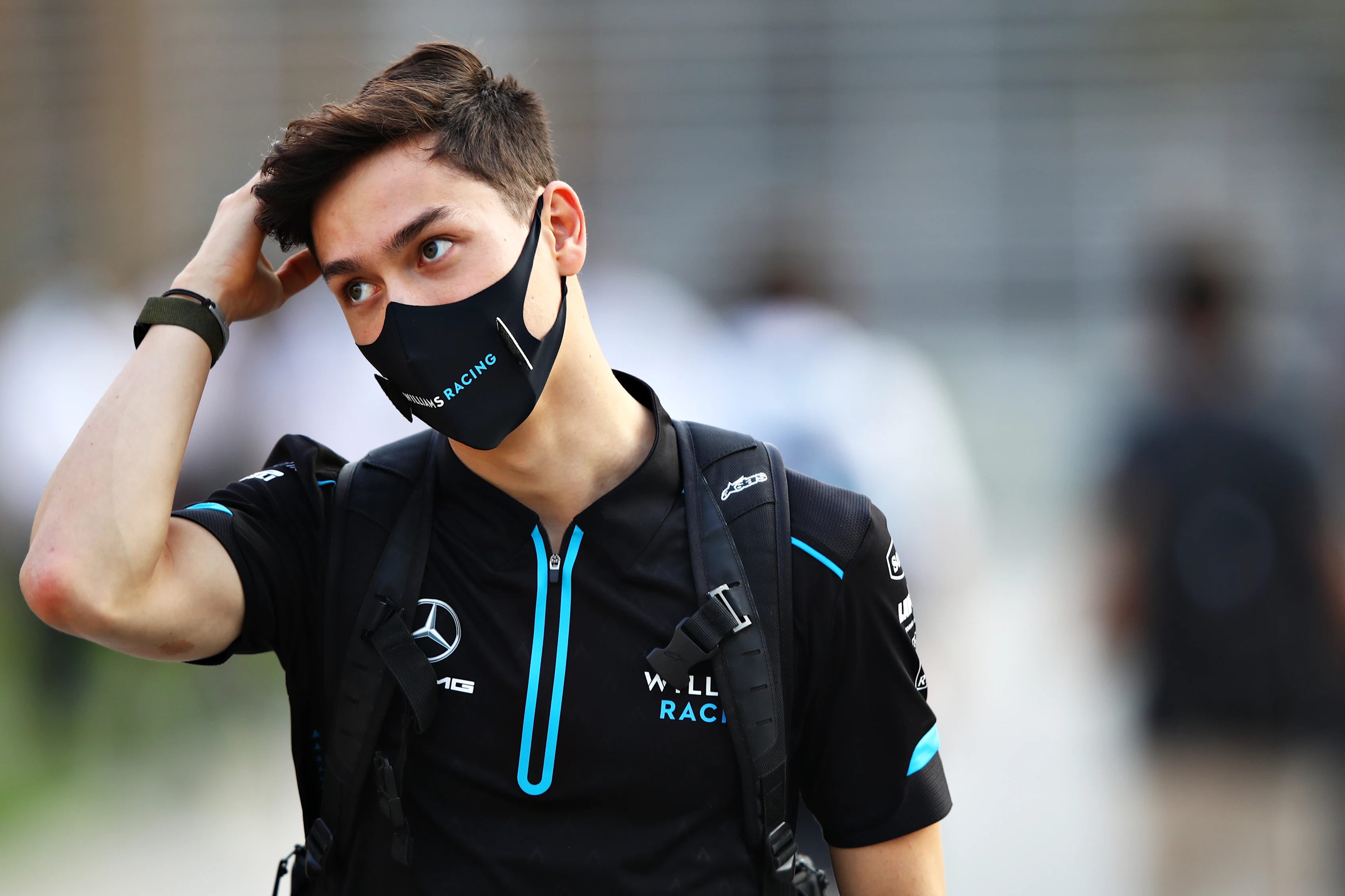 BAHRAIN, BAHRAIN - DECEMBER 03: Jack Aitken of Great Britain and Williams walks in the Paddock
