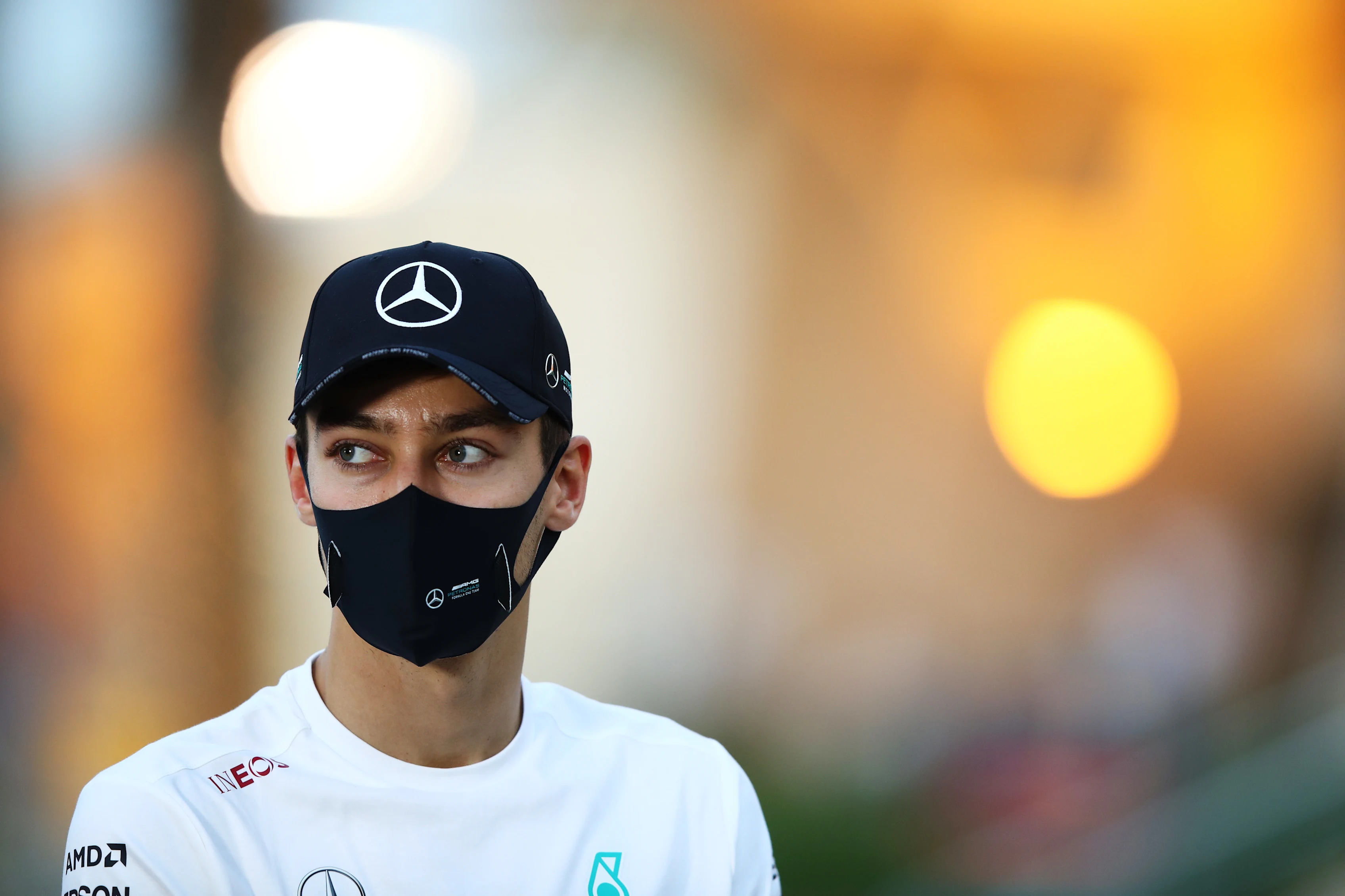 BAHRAIN, BAHRAIN - DECEMBER 03: George Russell of Great Britain and Mercedes GP looks on in the