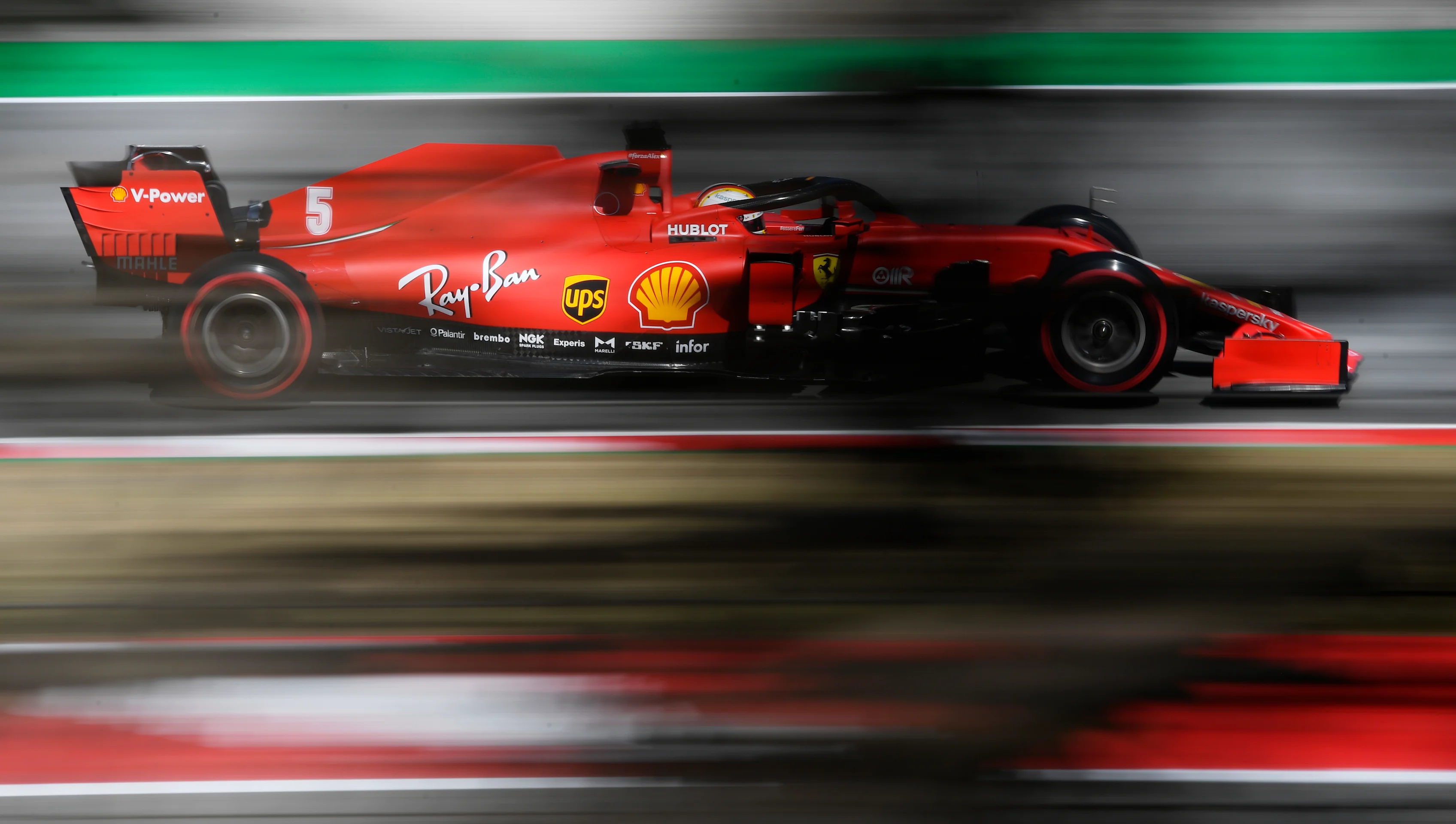 BARCELONA, SPAIN - AUGUST 14: Sebastian Vettel of Germany driving the (5) Scuderia Ferrari SF1000