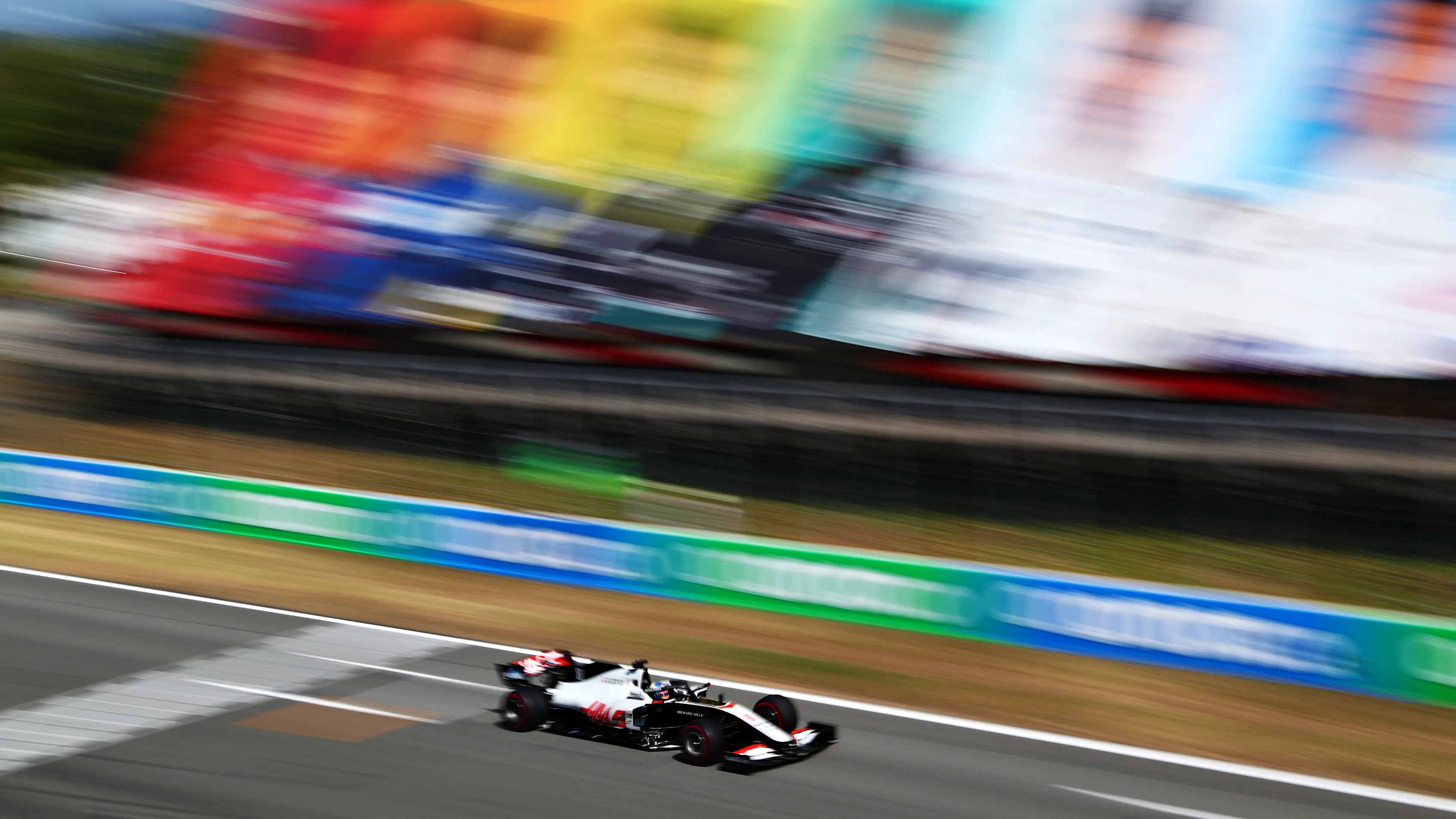 BARCELONA, SPAIN - AUGUST 14: Romain Grosjean of France driving the (8) Haas F1 Team VF-20 Ferrari