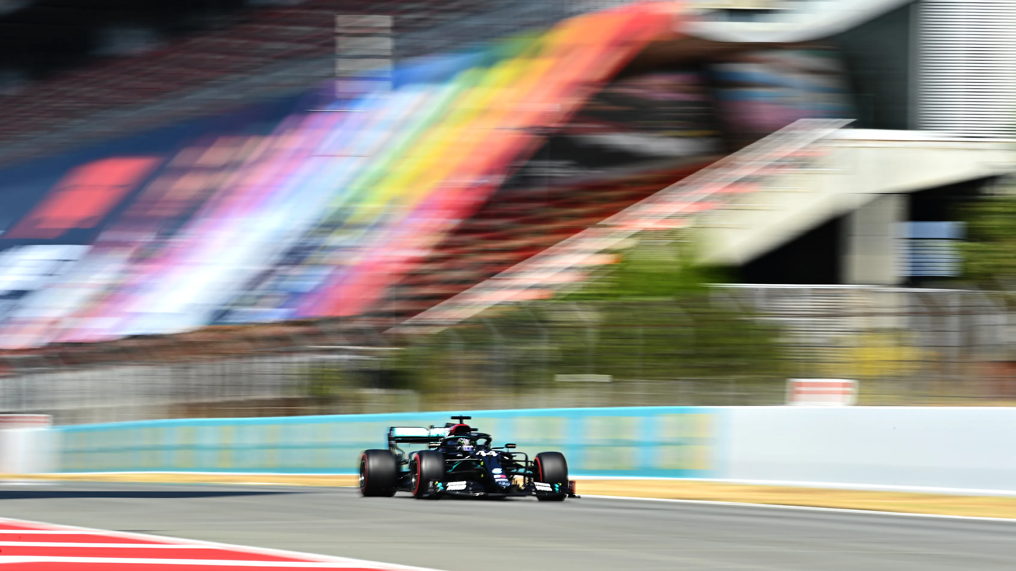 BARCELONA, SPAIN - AUGUST 15: Lewis Hamilton of Great Britain driving the (44) Mercedes AMG