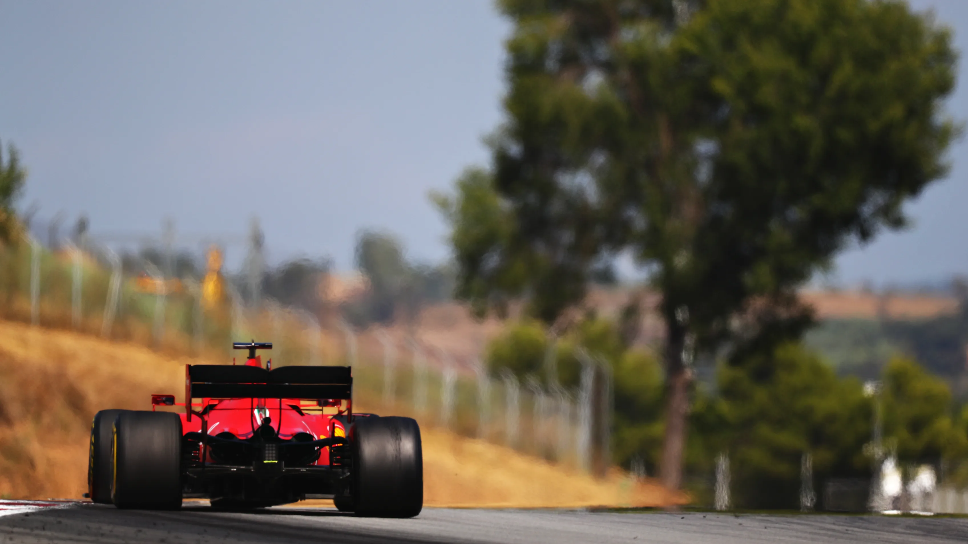 BARCELONA, SPAIN - AUGUST 16: Sebastian Vettel of Germany driving the (5) Scuderia Ferrari SF1000