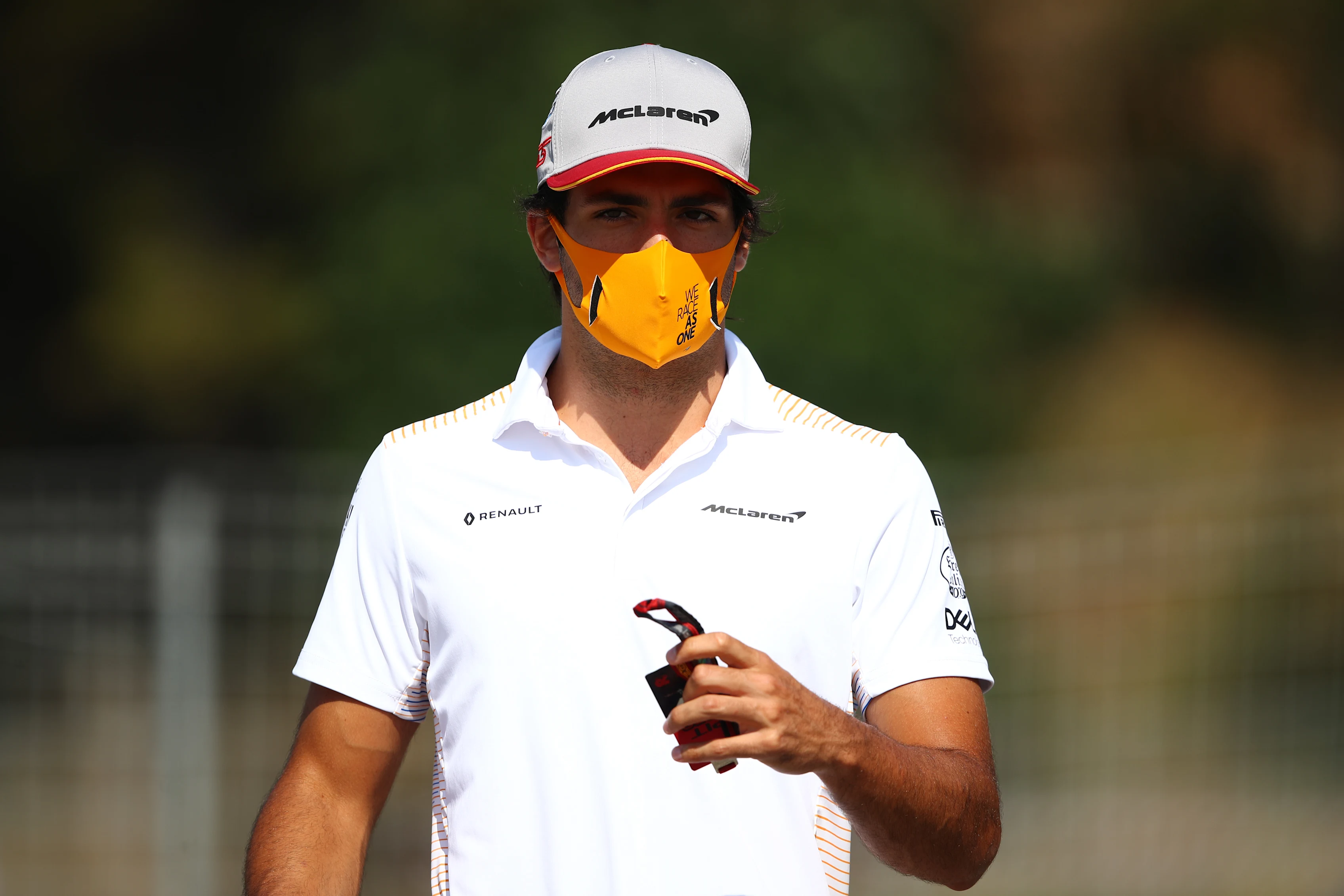 BARCELONA, SPAIN - AUGUST 13: Carlos Sainz of Spain and McLaren F1 arrives in the Paddock during