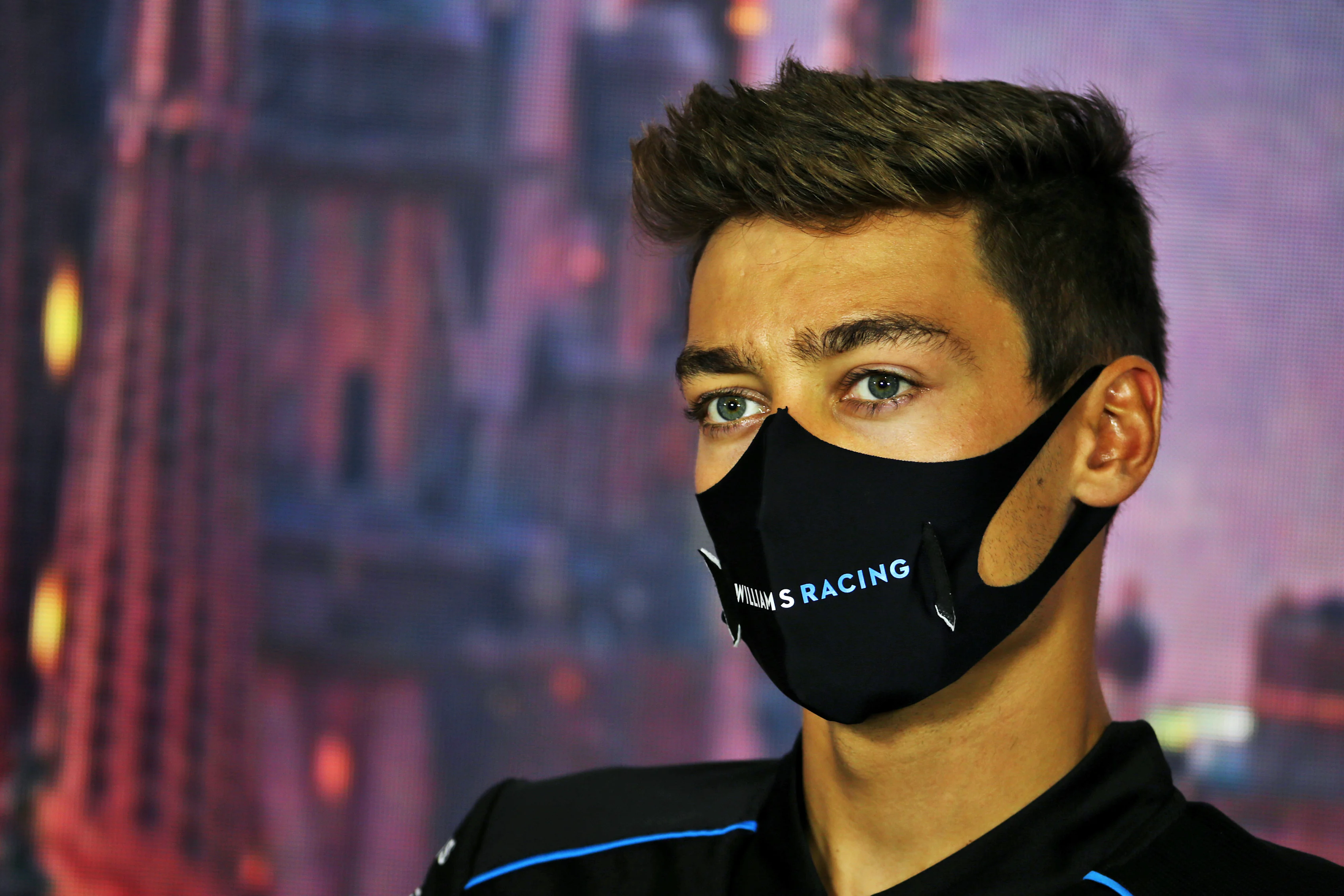 BARCELONA, SPAIN - AUGUST 13: George Russell of Great Britain and Williams talks in the Drivers