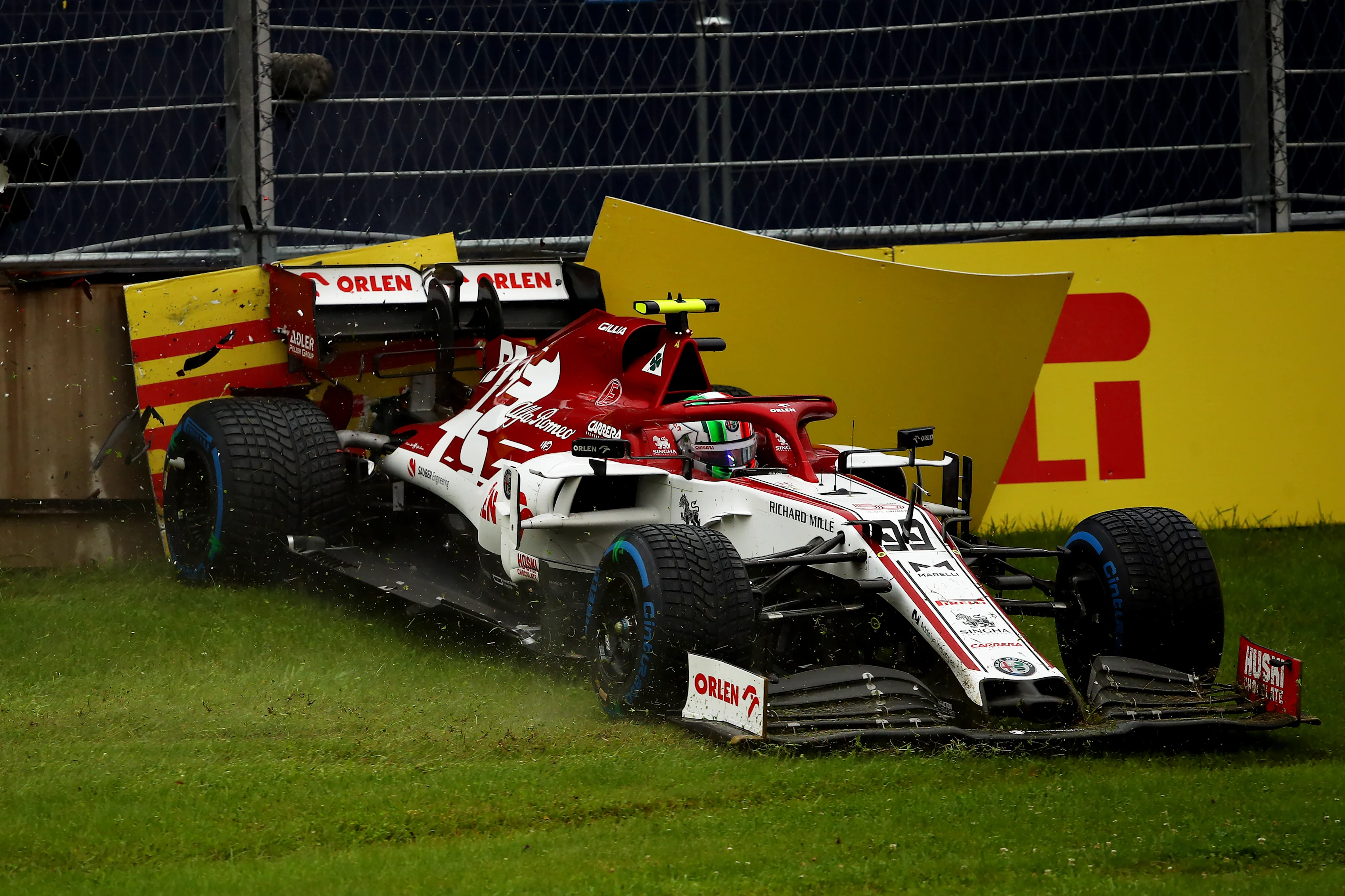 SPIELBERG, AUSTRIA - JULY 11: Antonio Giovinazzi of Italy driving the (99) Alfa Romeo Racing C39 Ferrari crashes during qualifying for the Formula One Grand Prix of Styria at Red Bull Ring on July 11, 2020 in Spielberg, Austria. (Photo by Bryn Lennon/Getty Images)