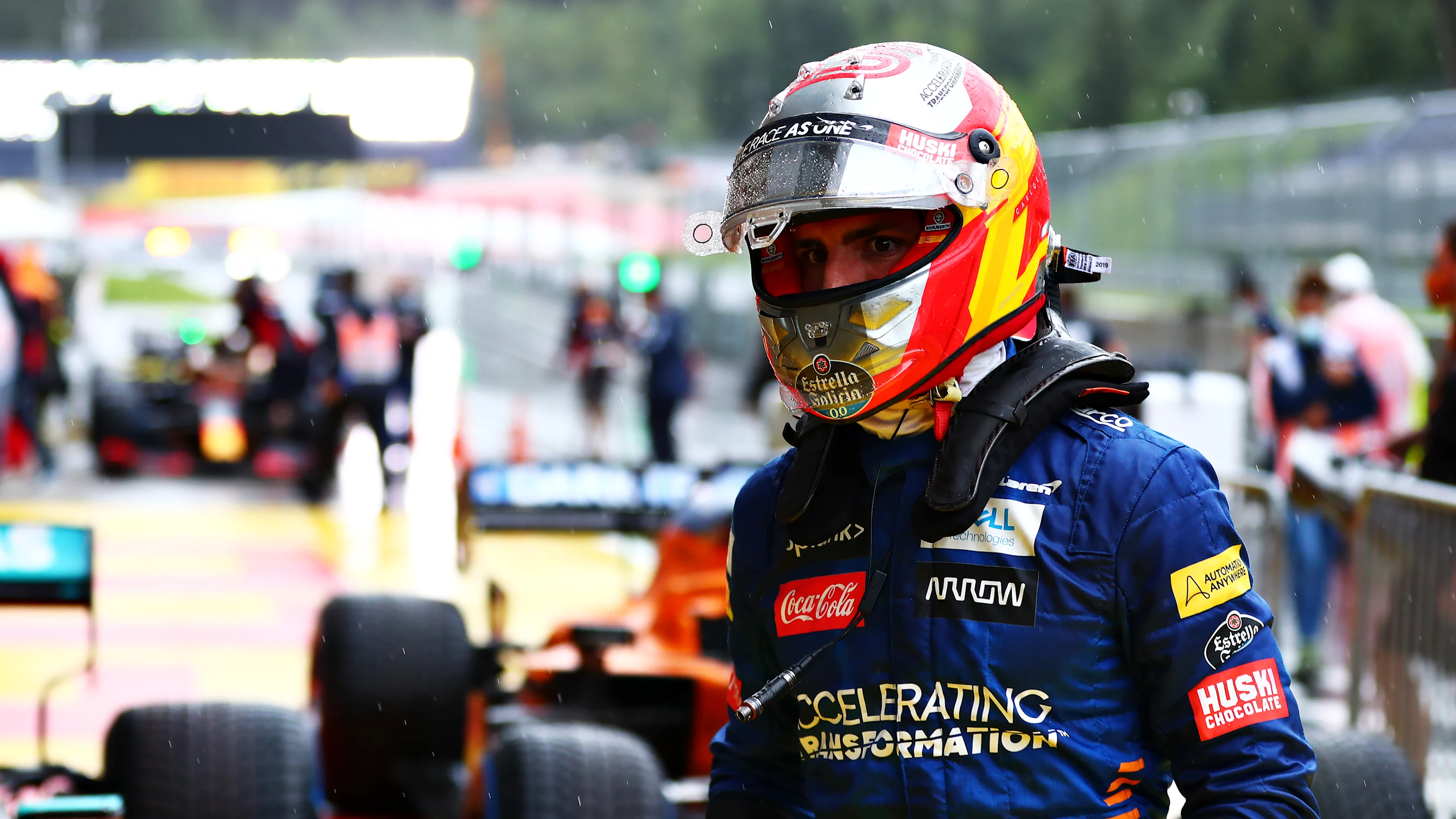 SPIELBERG, AUSTRIA - JULY 11: Third place qualifier Carlos Sainz of Spain and McLaren F1 celebrates