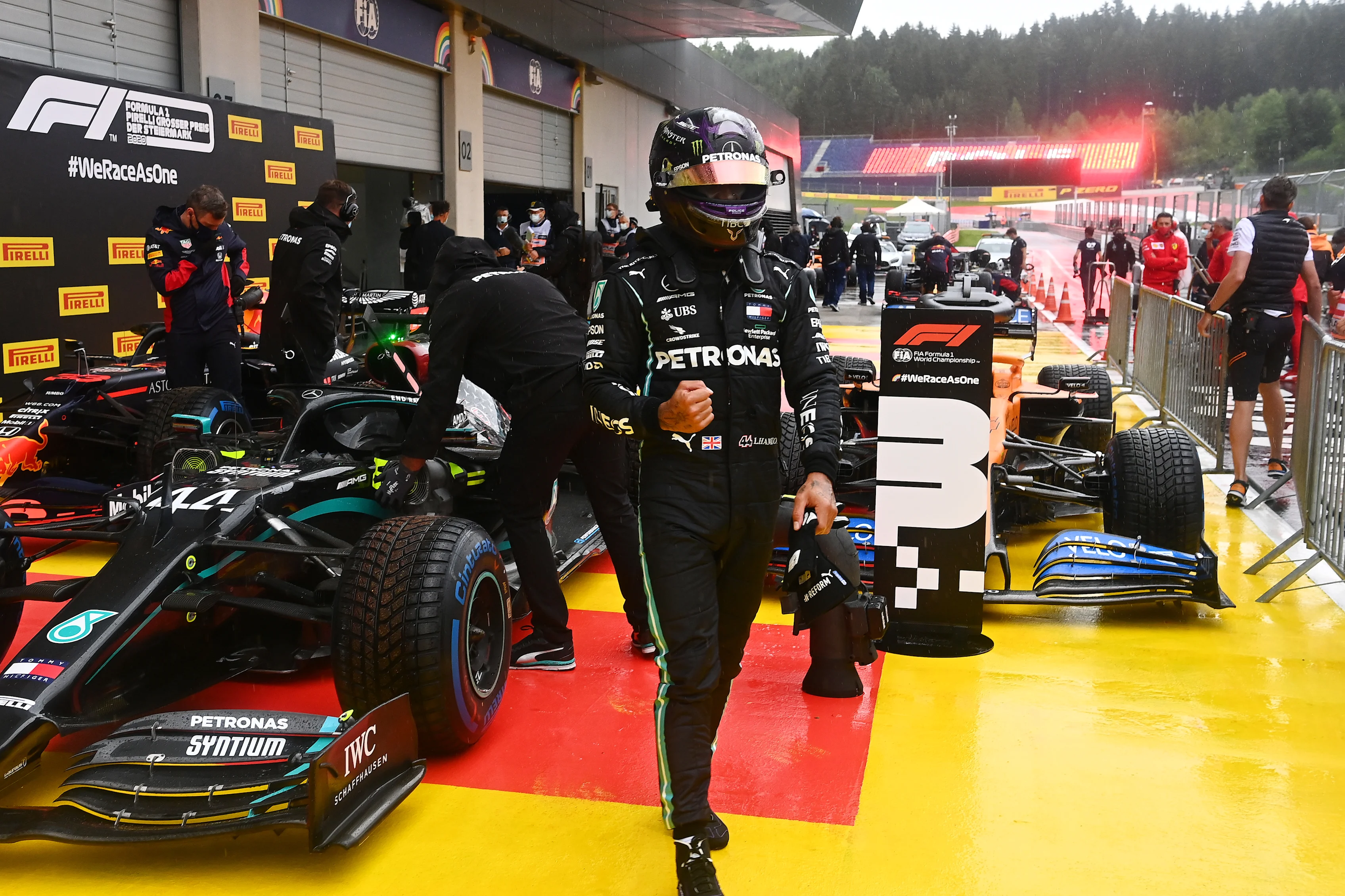 SPIELBERG, AUSTRIA - JULY 11: Pole position qualifier Lewis Hamilton of Great Britain and Mercedes GP celebrates in parc ferme during qualifying for the Formula One Grand Prix of Styria at Red Bull Ring on July 11, 2020 in Spielberg, Austria. (Photo by Joe Klamar/Pool via Getty Images)