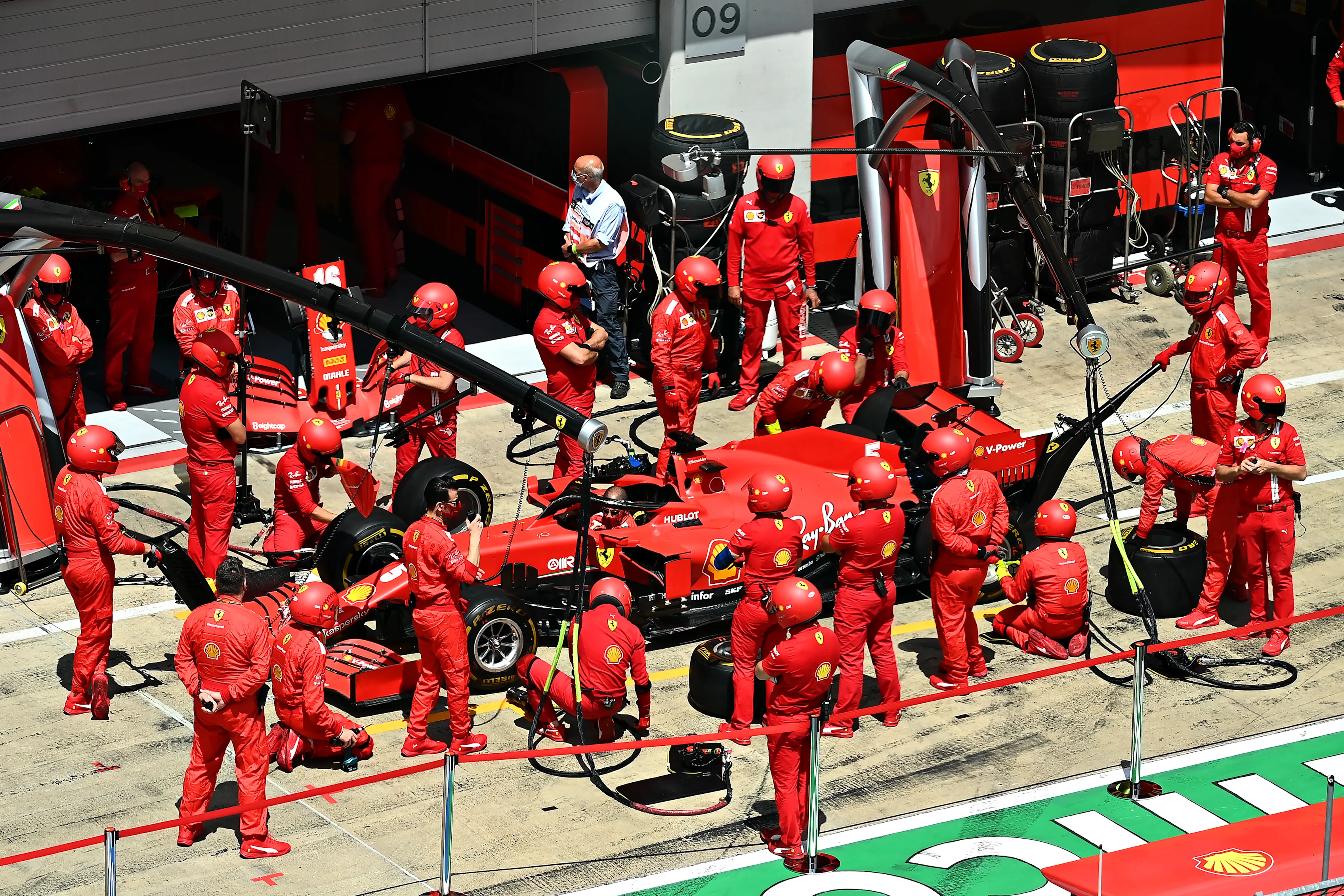 SPIELBERG, AUSTRIA - JULY 12: The Scuderia Ferrari team practice pitstops before the Formula One