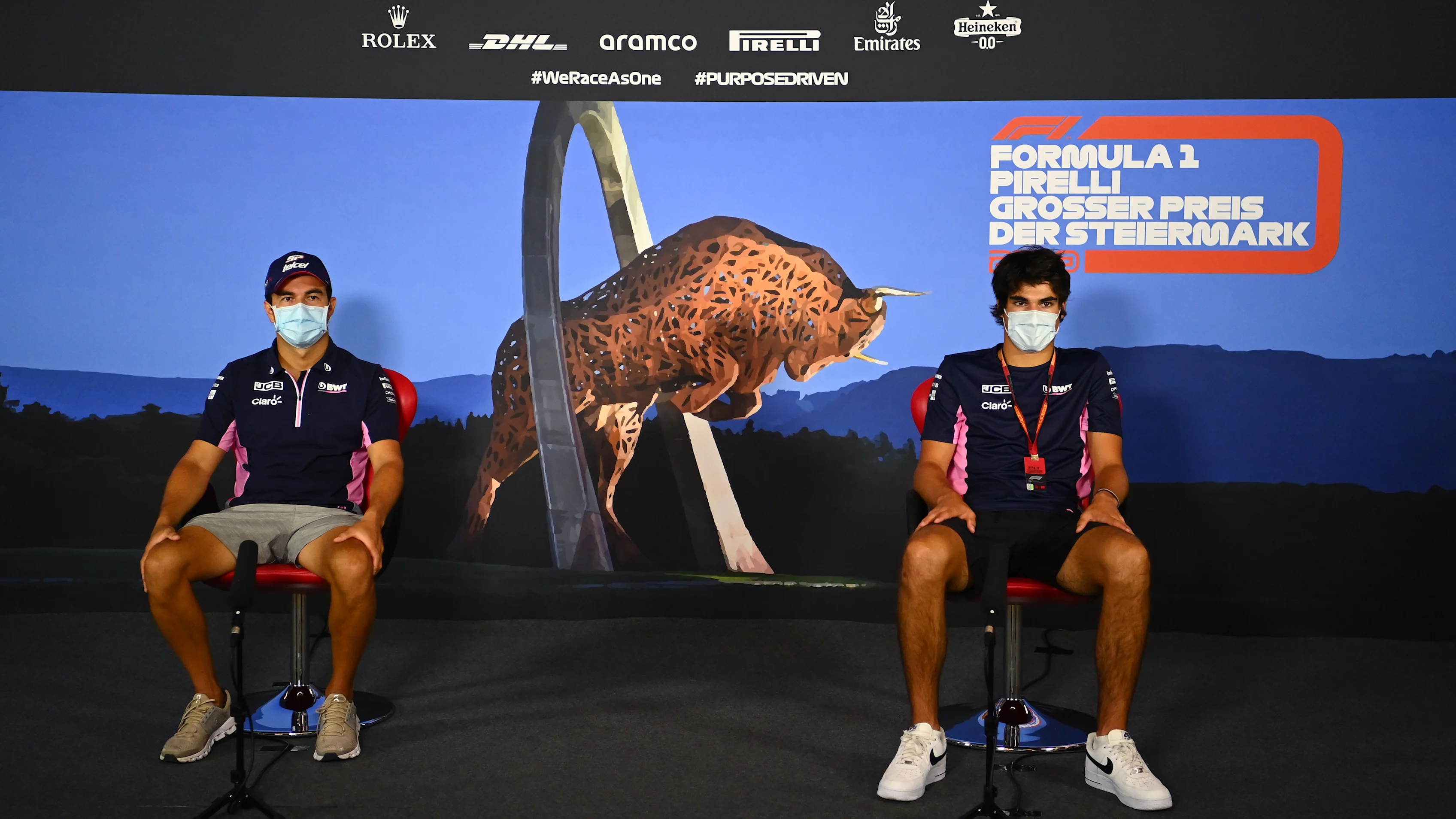 SPIELBERG, AUSTRIA - JULY 09: Sergio Perez of Mexico and Racing Point and Lance Stroll of Canada