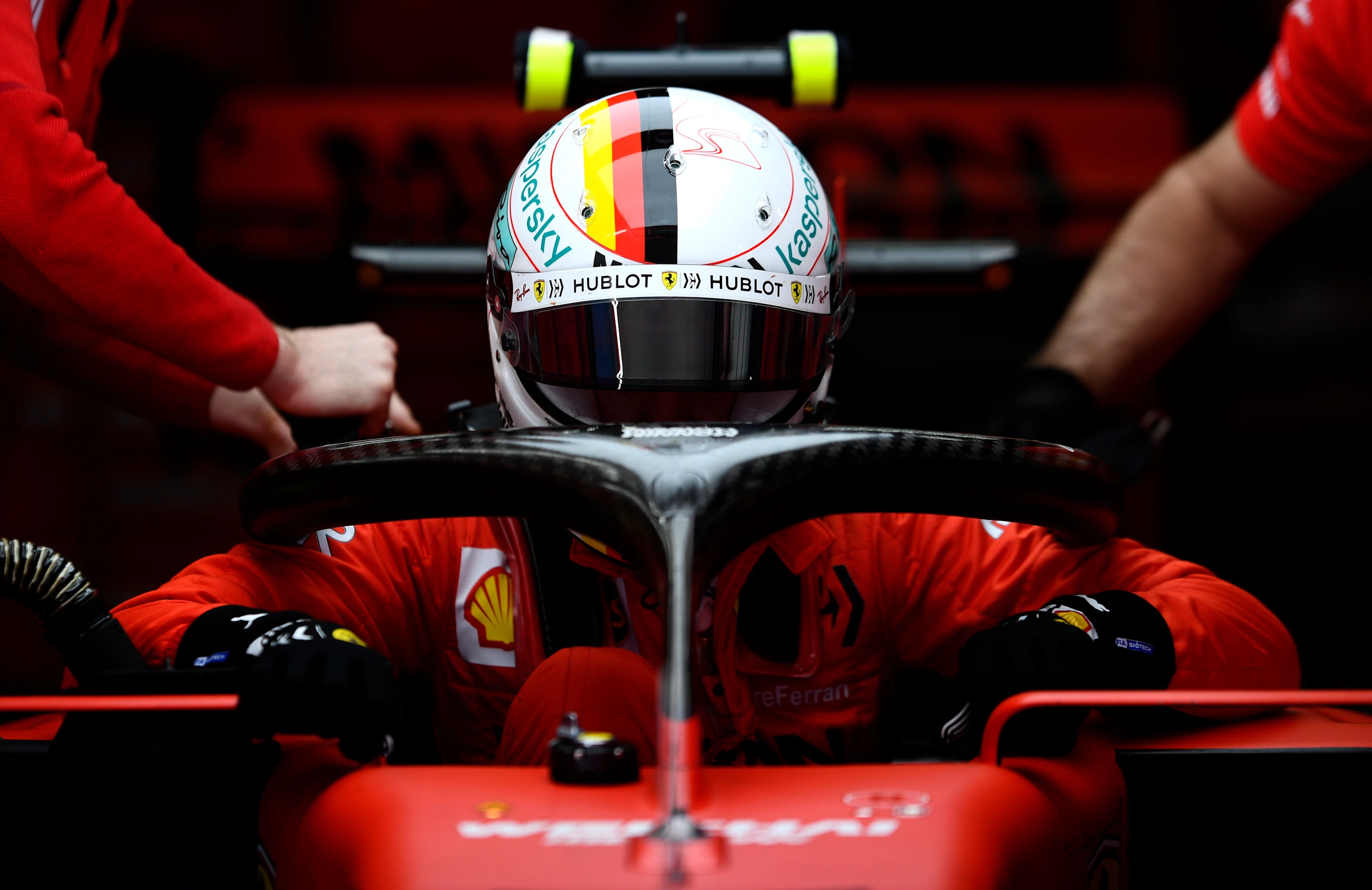 BARCELONA, SPAIN - FEBRUARY 27: Sebastian Vettel of Germany and Ferrari prepares to drive in the
