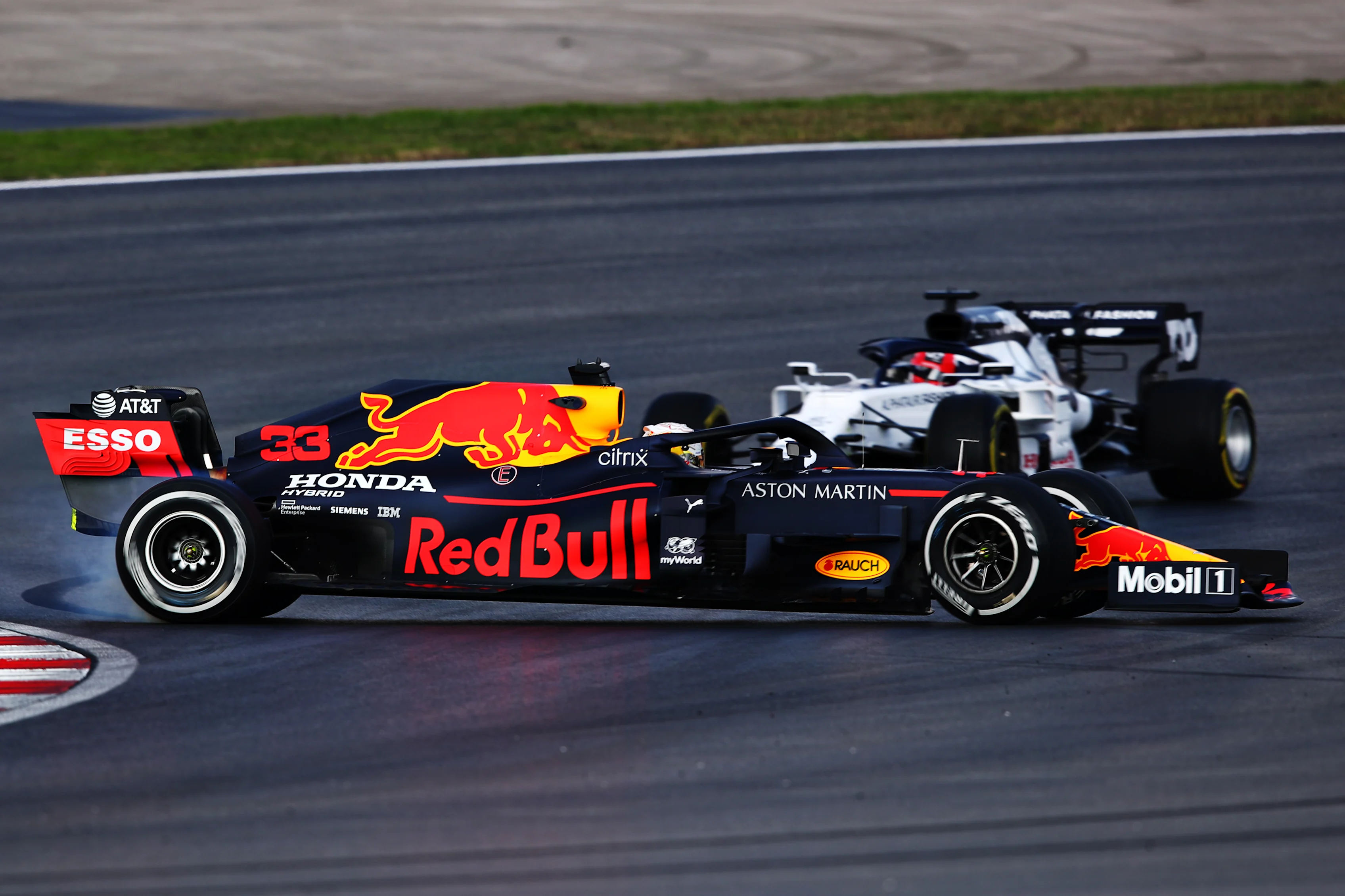ISTANBUL, TURKEY - NOVEMBER 13: Max Verstappen of the Netherlands driving the (33) Aston Martin Red Bull Racing RB16 spins in front of Daniil Kvyat of Russia driving the (26) Scuderia AlphaTauri AT01 Honda during practice ahead of the F1 Grand Prix of Turkey at Intercity Istanbul Park on November 13, 2020 in Istanbul, Turkey. (Photo by Joe Portlock - Formula 1/Formula 1 via Getty Images)