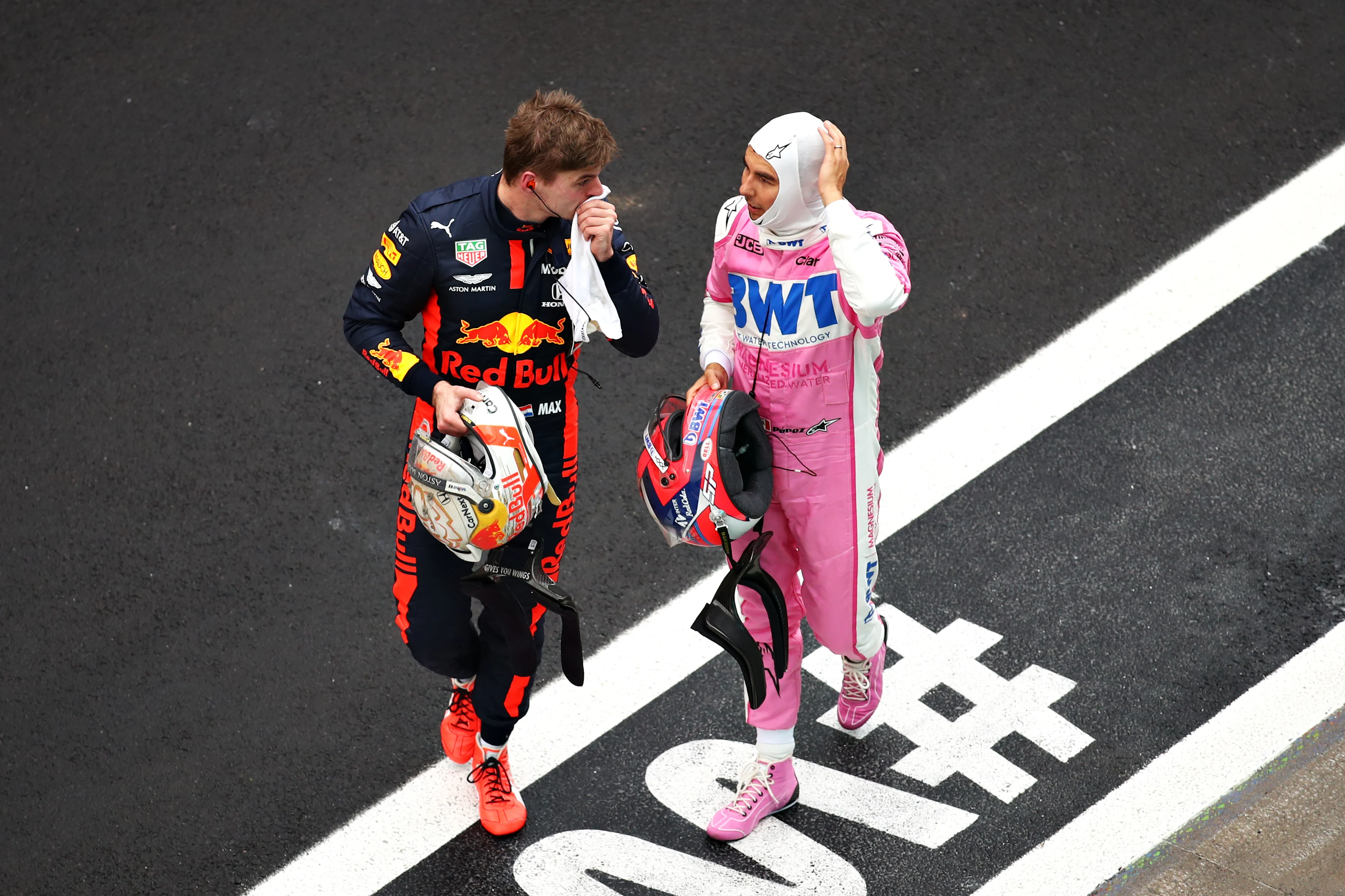 ISTANBUL, TURKEY - NOVEMBER 15: Max Verstappen of Netherlands and Red Bull Racing talks with second