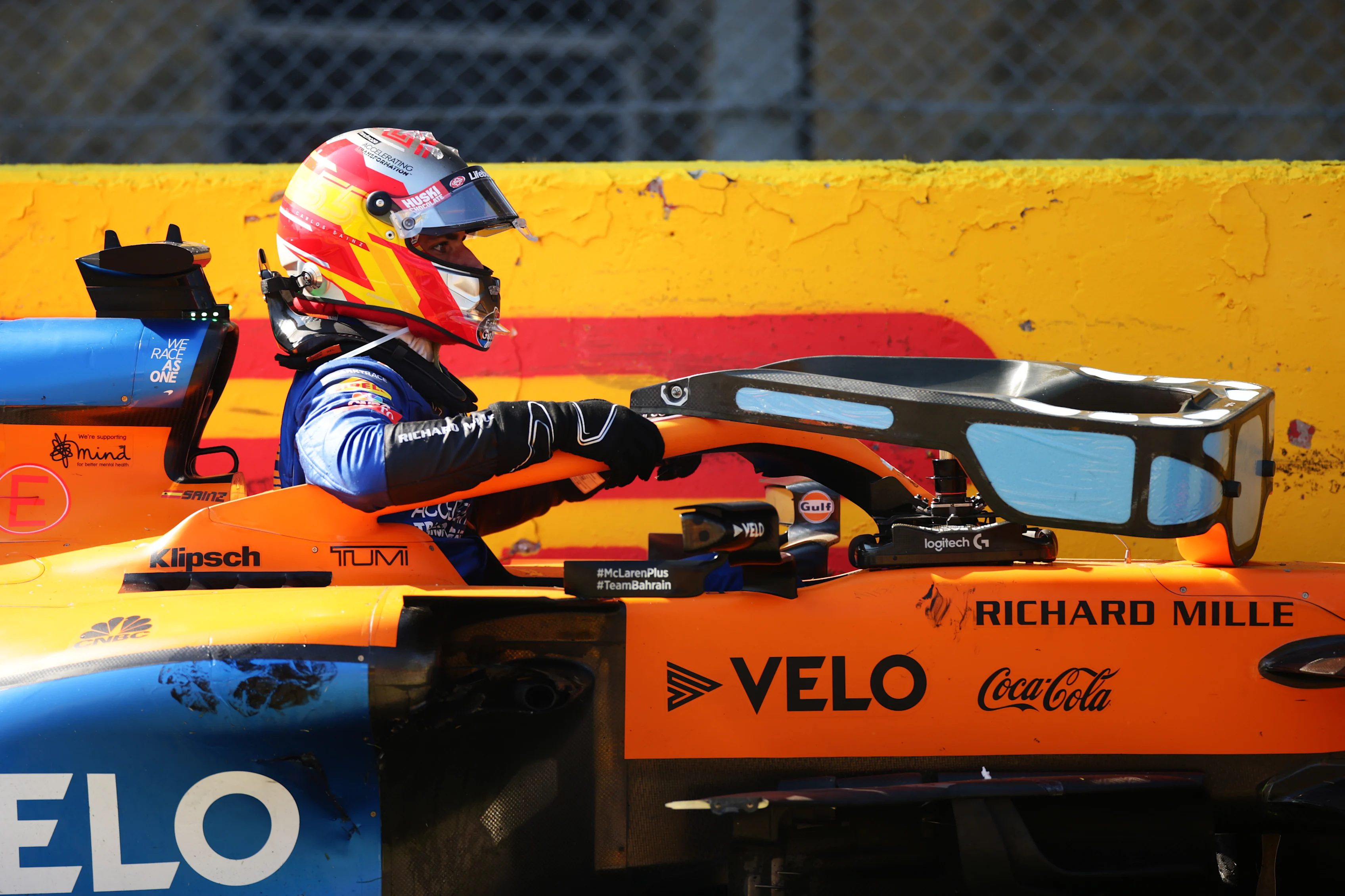 SCARPERIA, ITALY - SEPTEMBER 13: Carlos Sainz of Spain and McLaren F1 climbs out of his car after a
