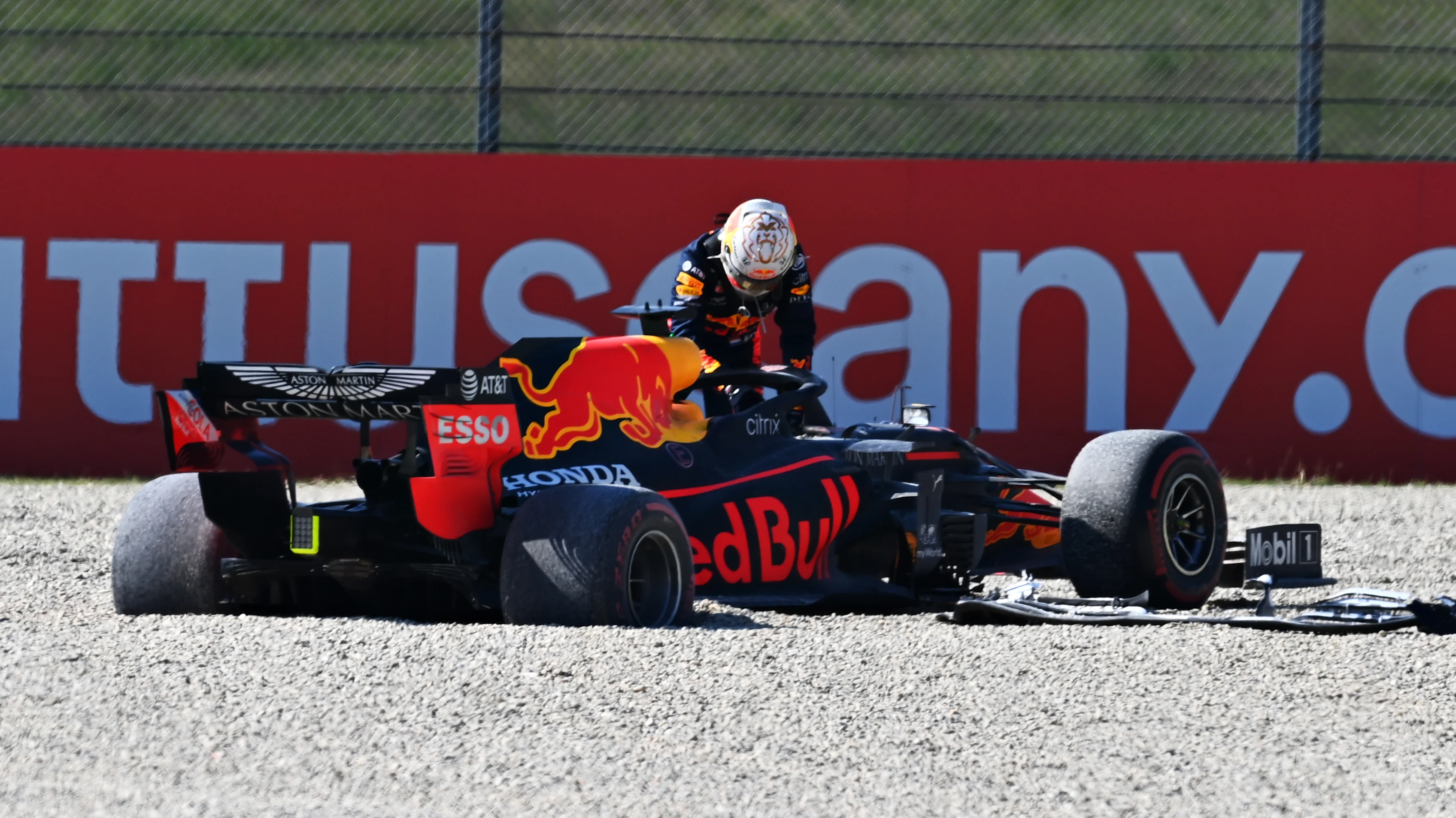 SCARPERIA, ITALY - SEPTEMBER 13: Max Verstappen of Netherlands and Red Bull Racing climbs out of