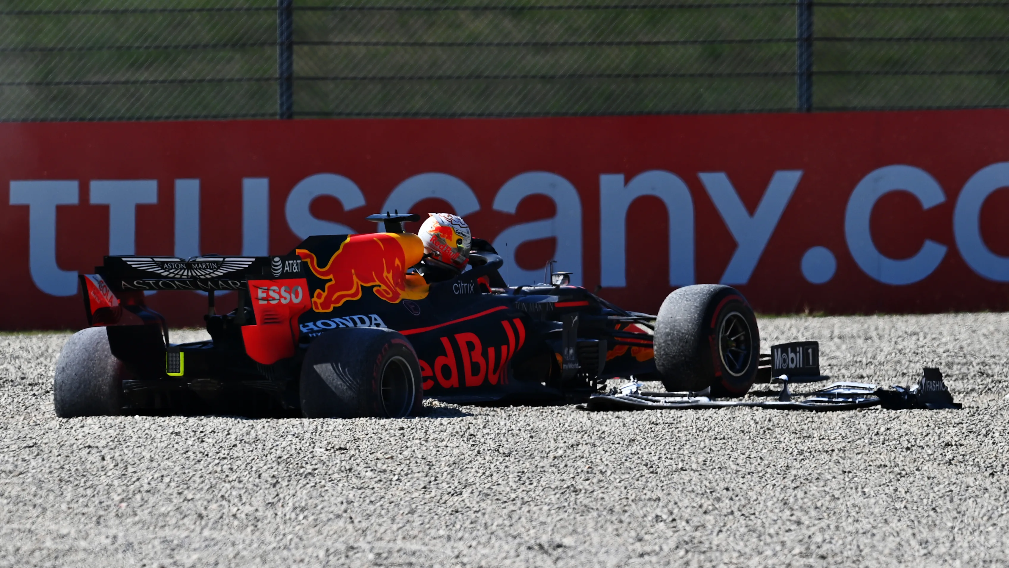 SCARPERIA, ITALY - SEPTEMBER 13: Max Verstappen of Netherlands and Red Bull Racing climbs out of his car after a collision during the F1 Grand Prix of Tuscany at Mugello Circuit on September 13, 2020 in Scarperia, Italy. (Photo by Clive Mason - Formula 1/Formula 1 via Getty Images)
