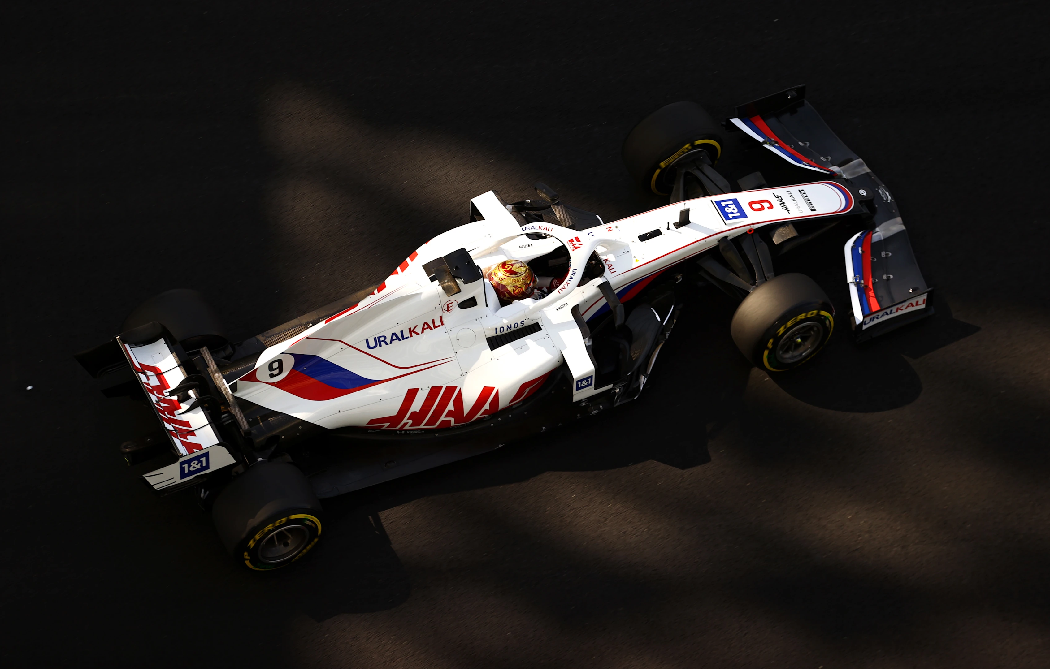 ABU DHABI, UNITED ARAB EMIRATES - DECEMBER 10:Nikita Mazepin of Russia driving the (9) Haas F1 Team VF-21 Ferrari  during practice ahead of the F1 Grand Prix of Abu Dhabi at Yas Marina Circuit on December 10, 2021 in Abu Dhabi, United Arab Emirates. (Photo by Bryn Lennon/Getty Images)