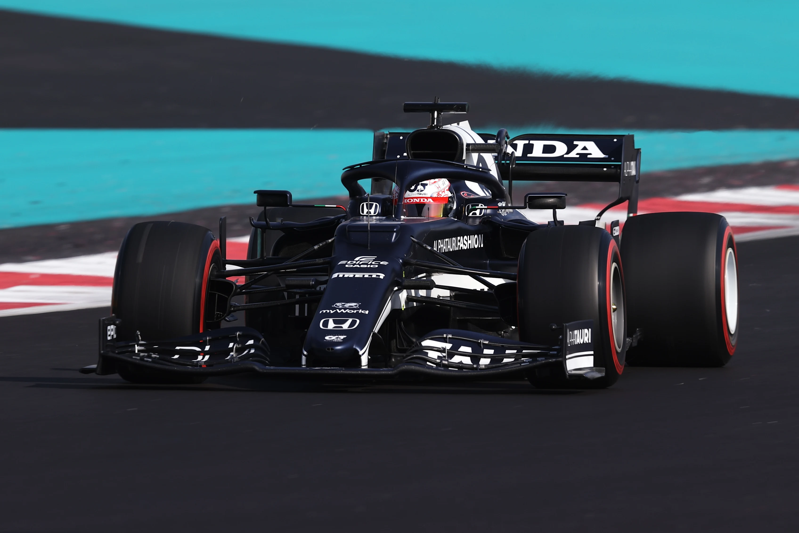 ABU DHABI, UNITED ARAB EMIRATES - DECEMBER 10: Yuki Tsunoda of Japan driving the (22) Scuderia AlphaTauri AT02 Honda during practice ahead of the F1 Grand Prix of Abu Dhabi at Yas Marina Circuit on December 10, 2021 in Abu Dhabi, United Arab Emirates. (Photo by Lars Baron/Getty Images)